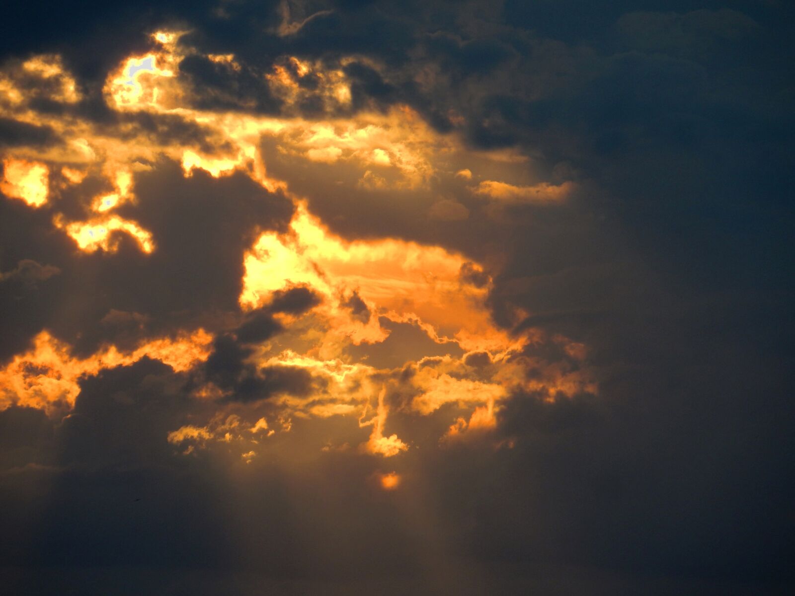 Nikon Coolpix S9900 sample photo. Sunset, raincloud, clouds photography