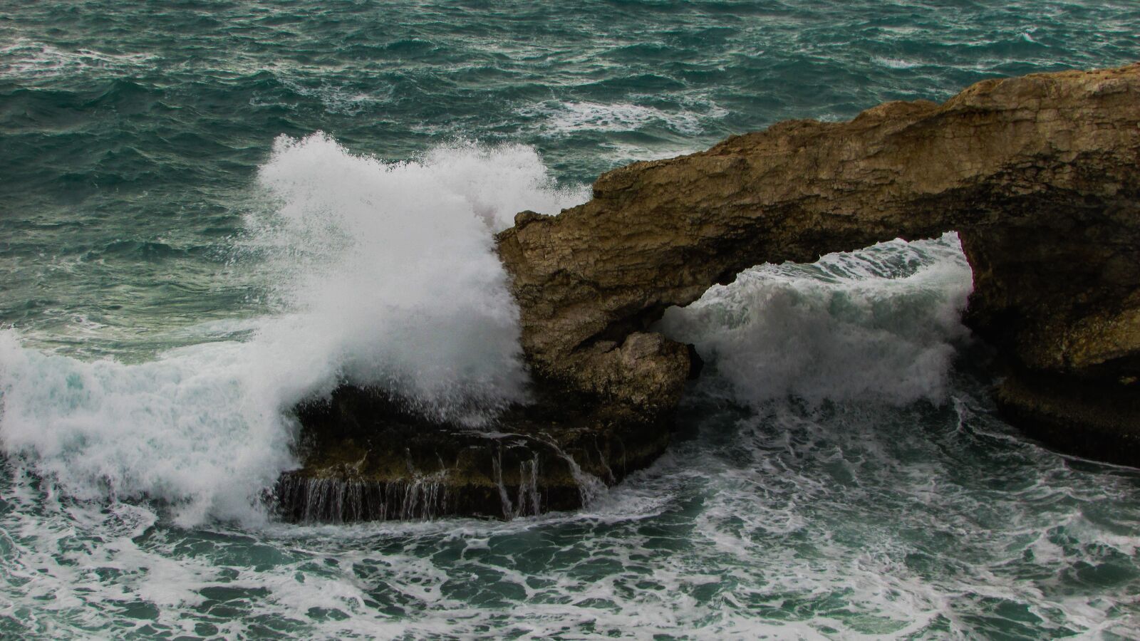Canon PowerShot SX400 IS sample photo. Rocky coast, natural arch photography
