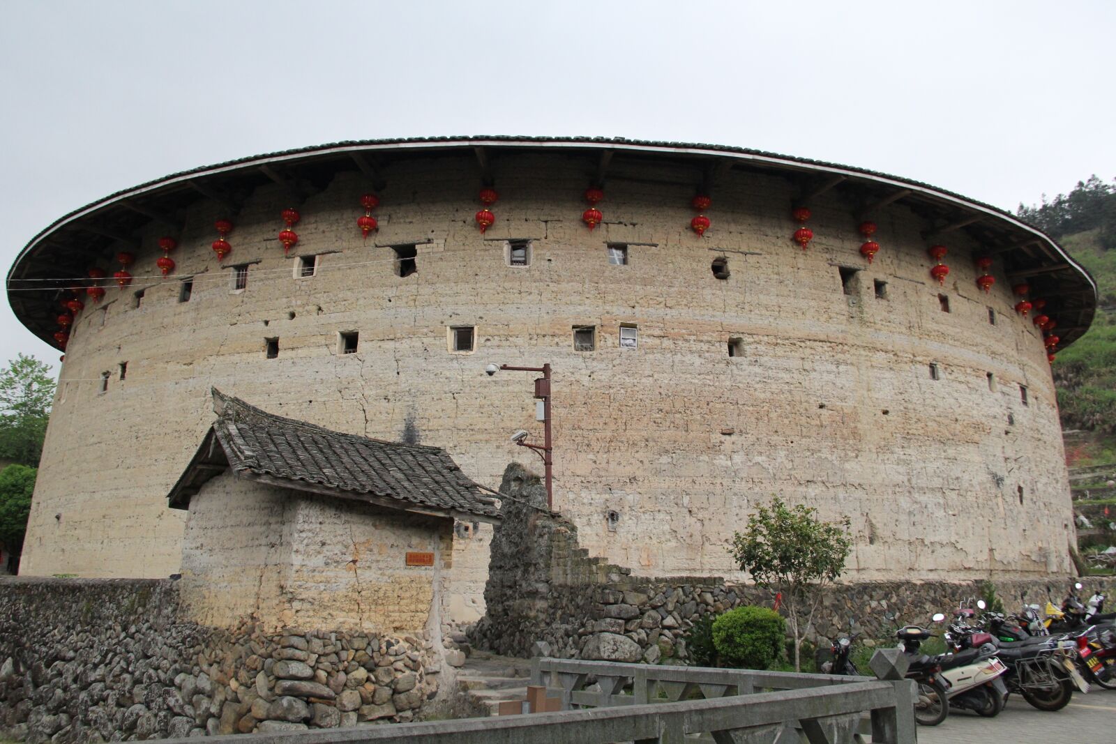 Canon EF-S 18-135mm F3.5-5.6 IS sample photo. China, fujian, earth building photography