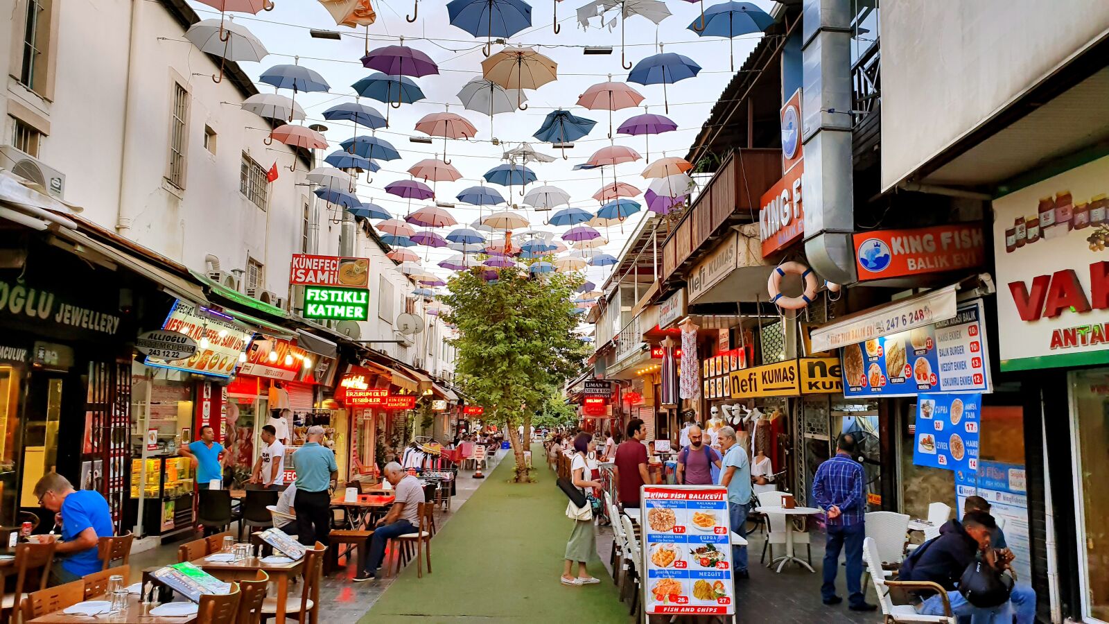 Samsung Galaxy S10e sample photo. Umbrella, street with umbrella photography