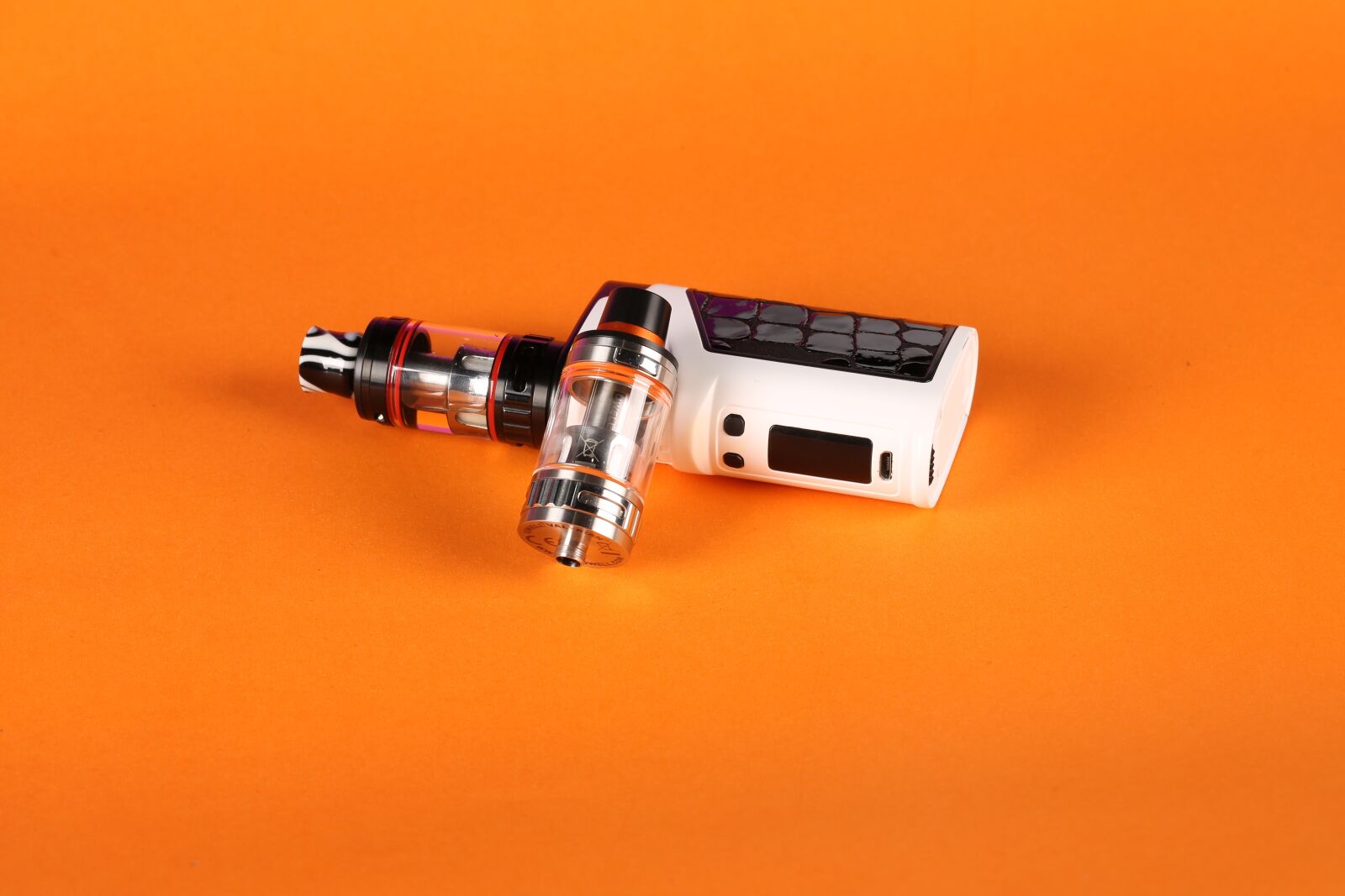 Canon EF 100mm F2.8L Macro IS USM sample photo. Electronic cigarette, orange, atomizer photography