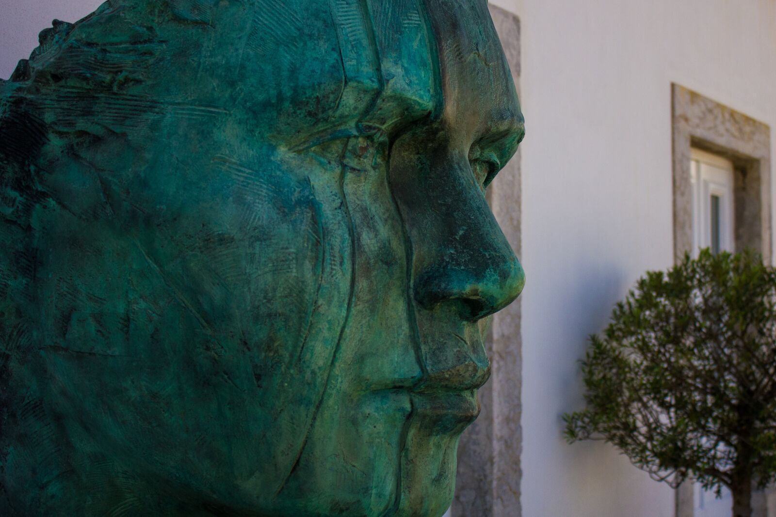 Canon EF-S 18-55mm F3.5-5.6 IS sample photo. Face, sculpture, statue photography