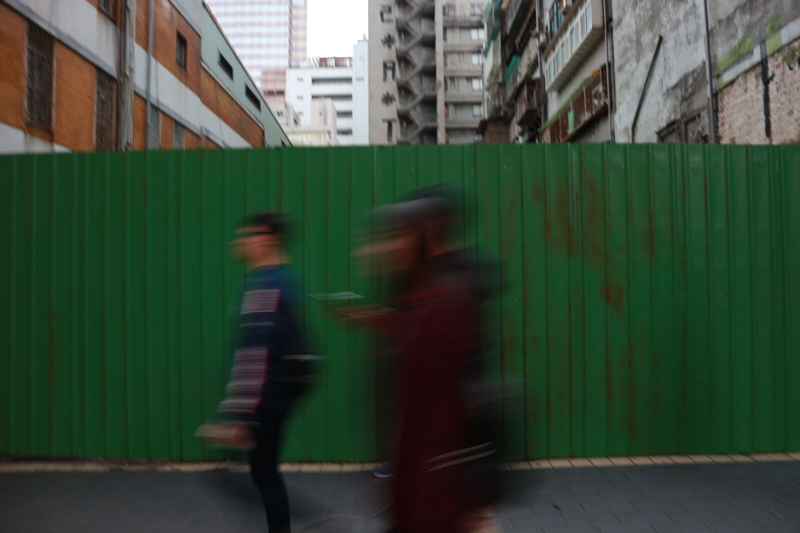 Canon EOS M sample photo. Blurred, motion, of, people photography