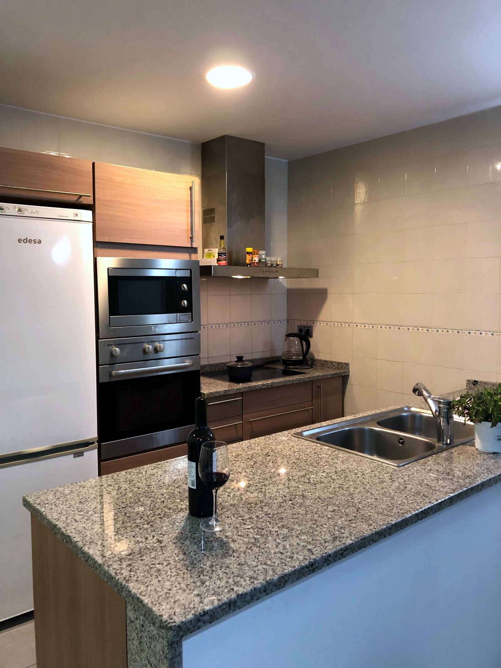 iPhone X back dual camera 4mm f/1.8 sample photo. Kitchen, island, interior photography