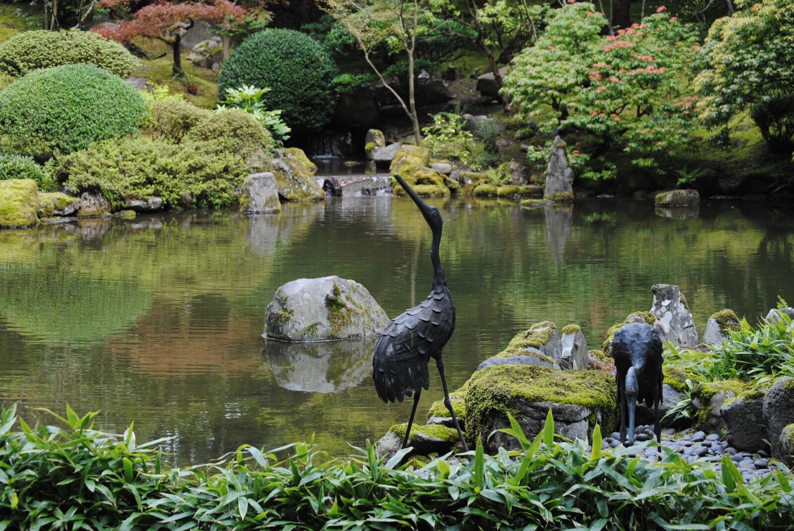 Nikon D3000 sample photo. Statues, japanese garden, garden photography