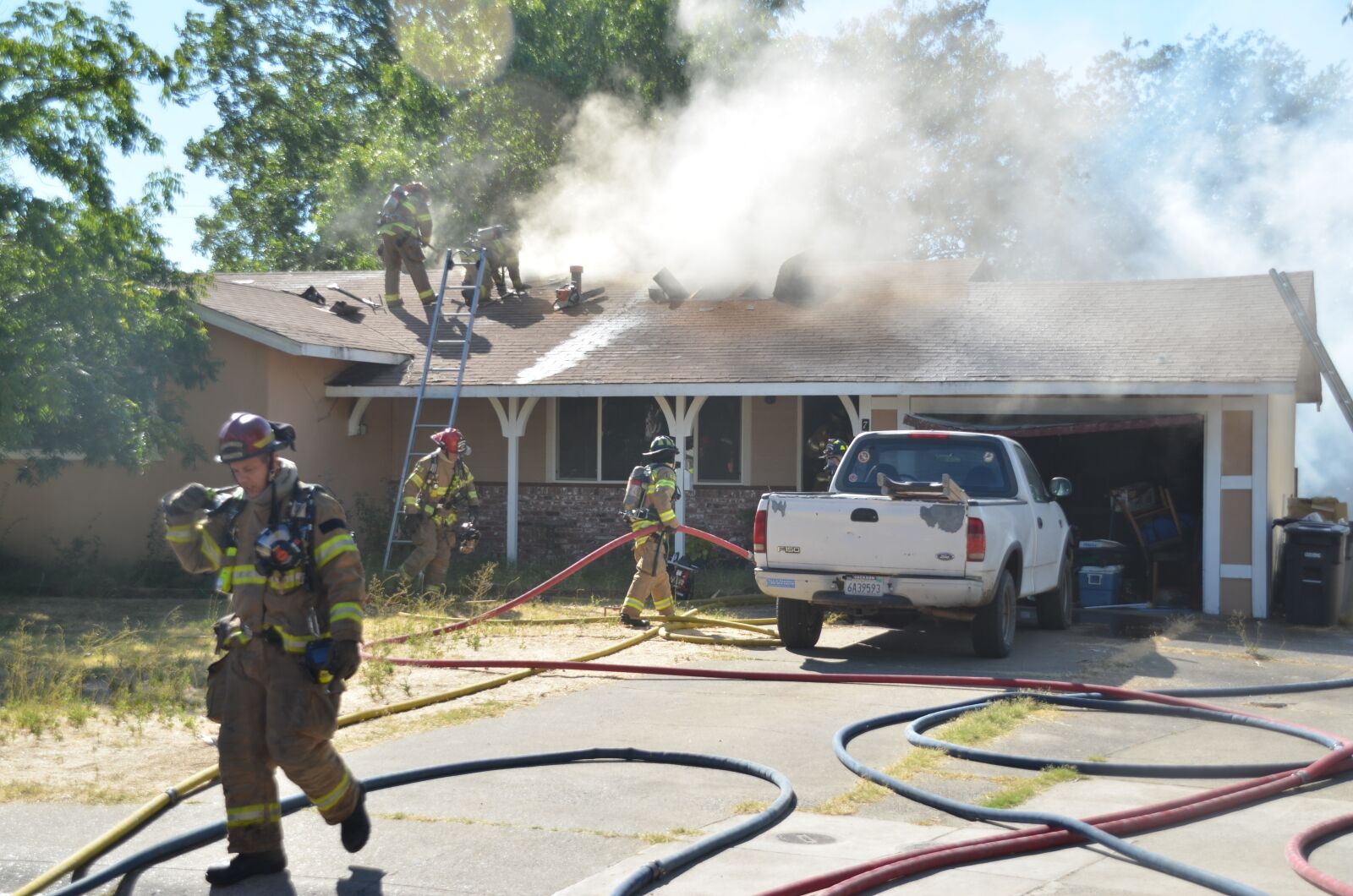 Nikon D7000 sample photo. House fire, fireman, home photography