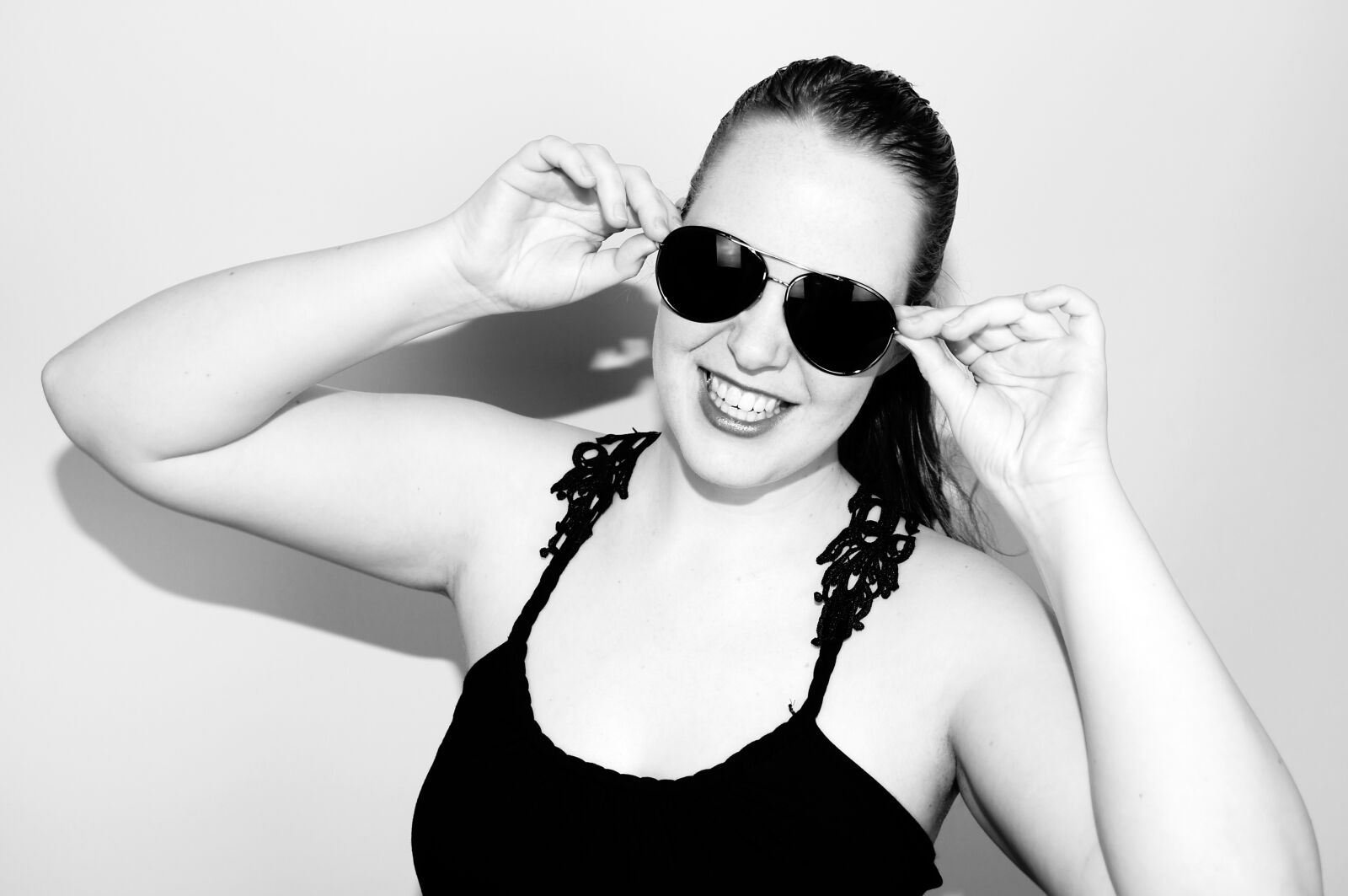 17-50mm F2.8 sample photo. Woman, sunglasses, ponytail photography