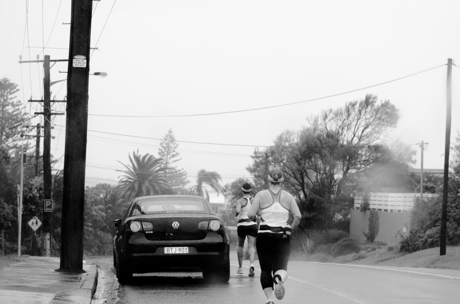 Nikon D7000 sample photo. Joggers, street, car photography