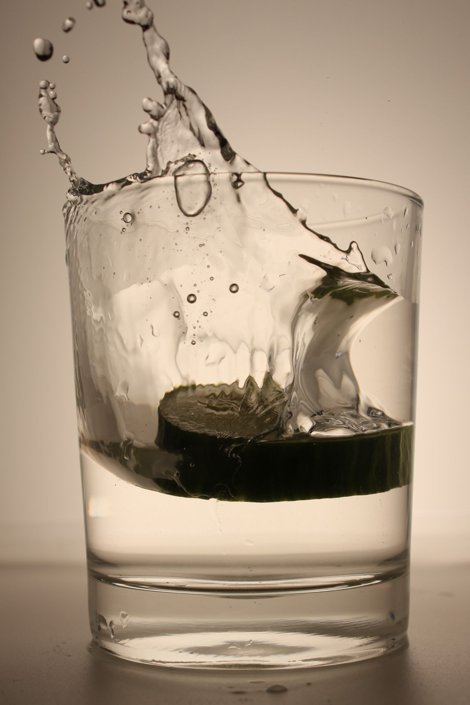 Canon EF-S 18-55mm F3.5-5.6 IS sample photo. Water, glass, cucumber photography