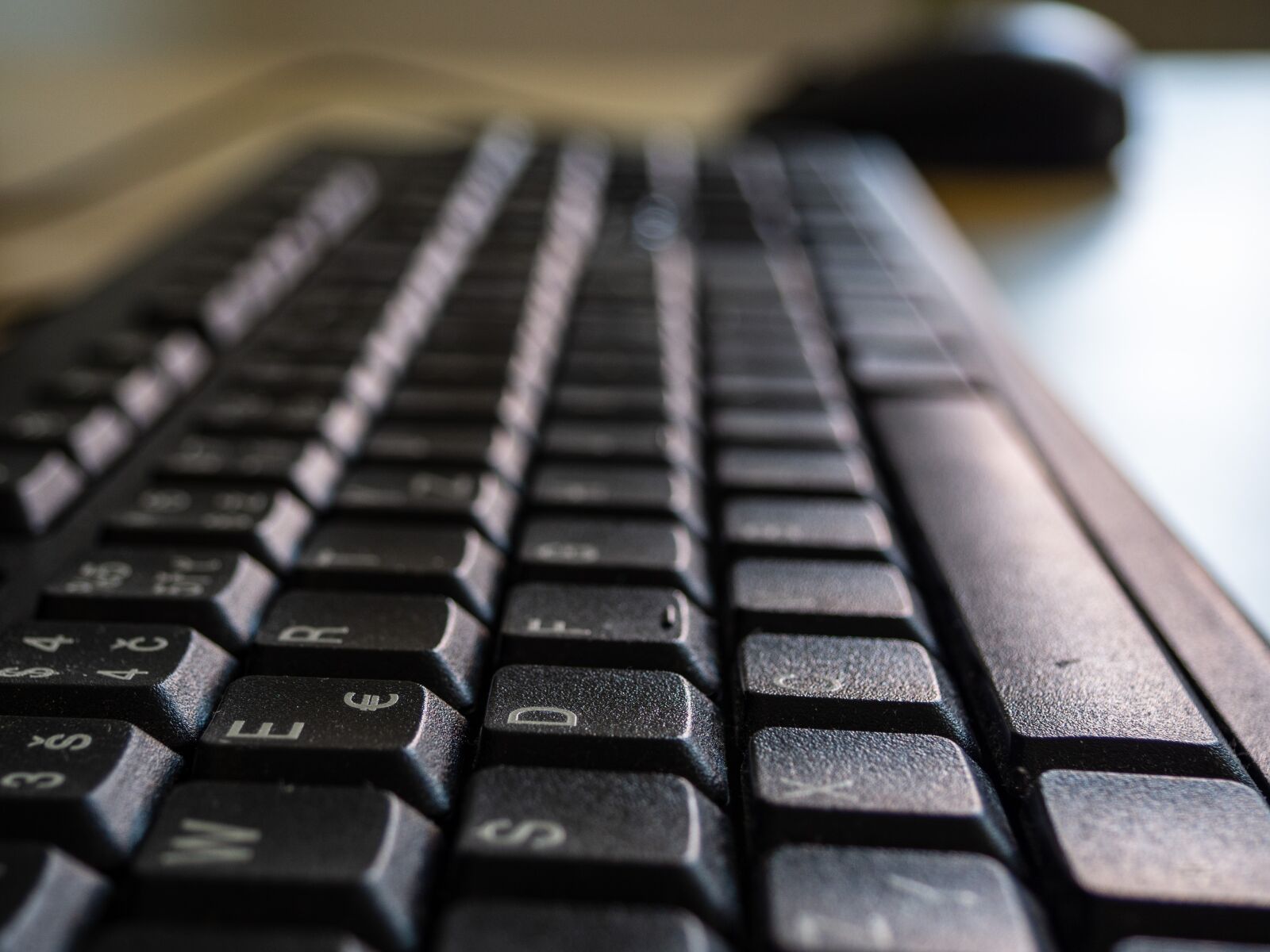 Olympus OM-D E-M10 III sample photo. Abstract, keyboard, mouse photography