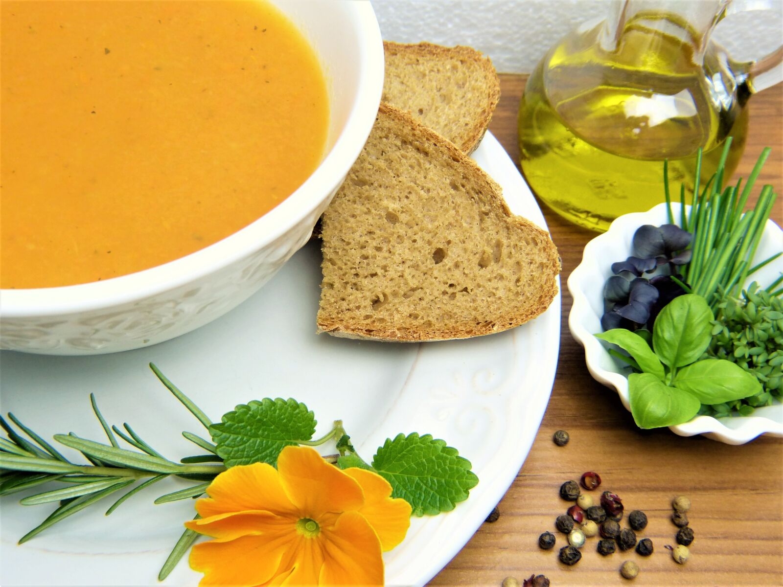 Panasonic Lumix DMC-FZ150 sample photo. Carrot soup, bread, herbs photography