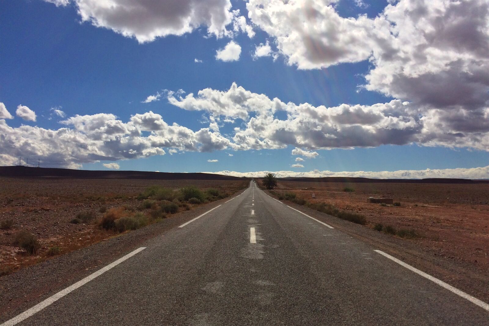 iPhone 5s back camera 4.15mm f/2.2 sample photo. Road, blue sky, desert photography