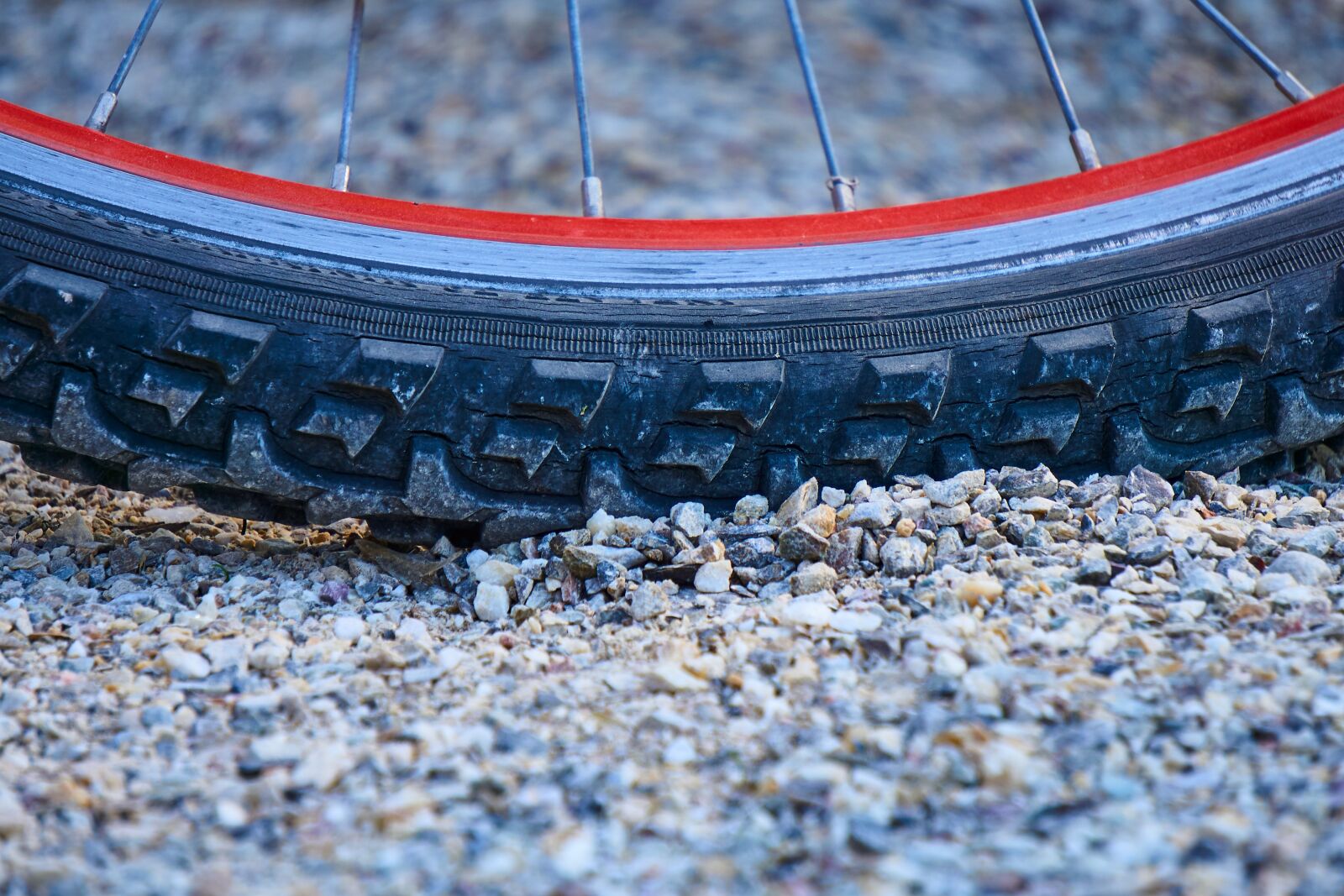 Sony E 55-210mm F4.5-6.3 OSS sample photo. Bicycle tires, profile, mature photography