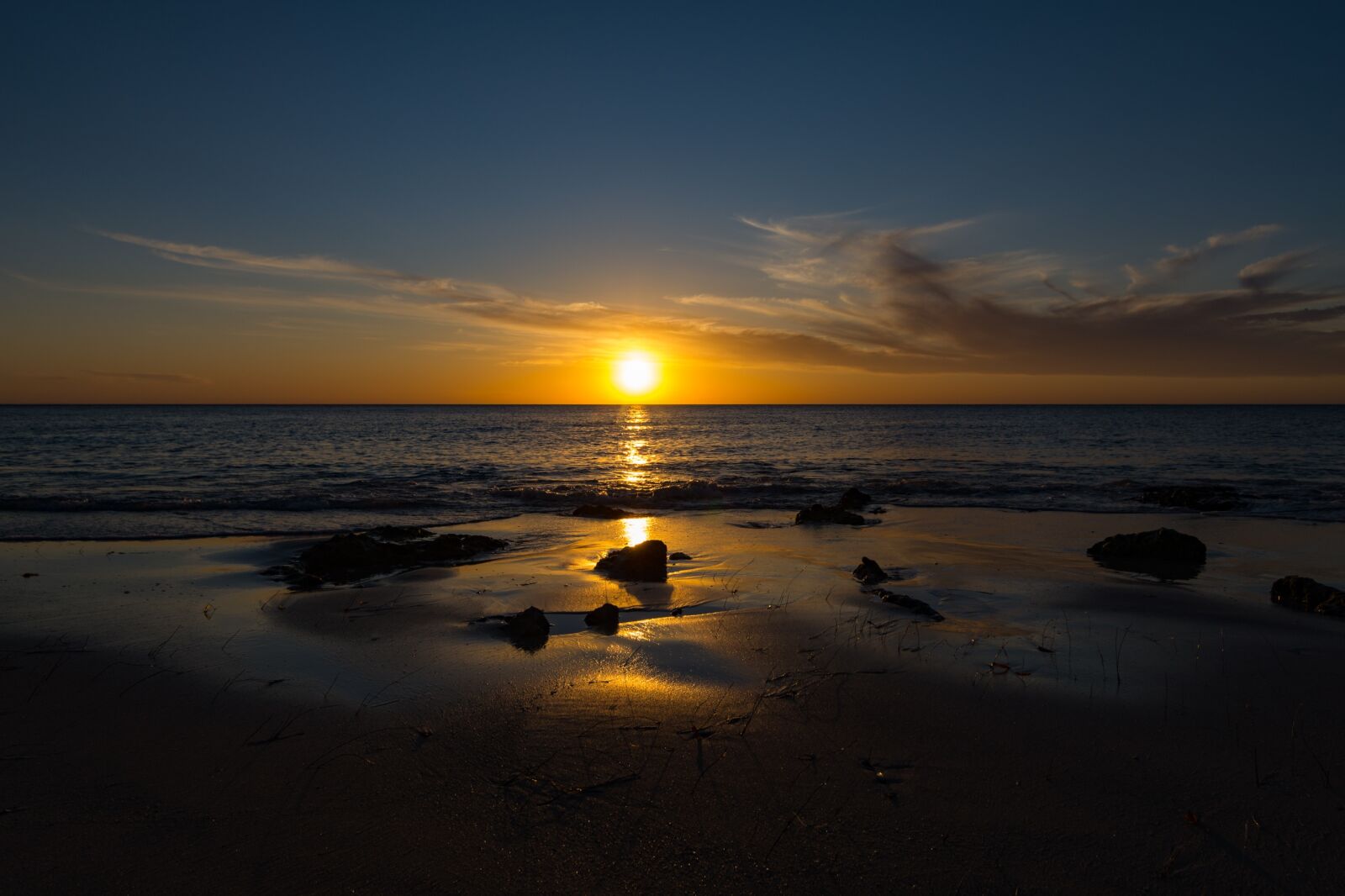 Nikon D7200 sample photo. Sunset, beach, rocks photography