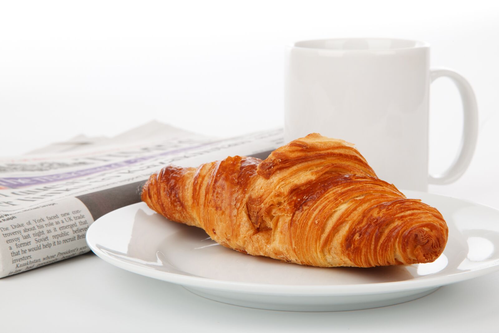 Canon EOS 5D Mark II sample photo. Crossant, bread, on, white photography
