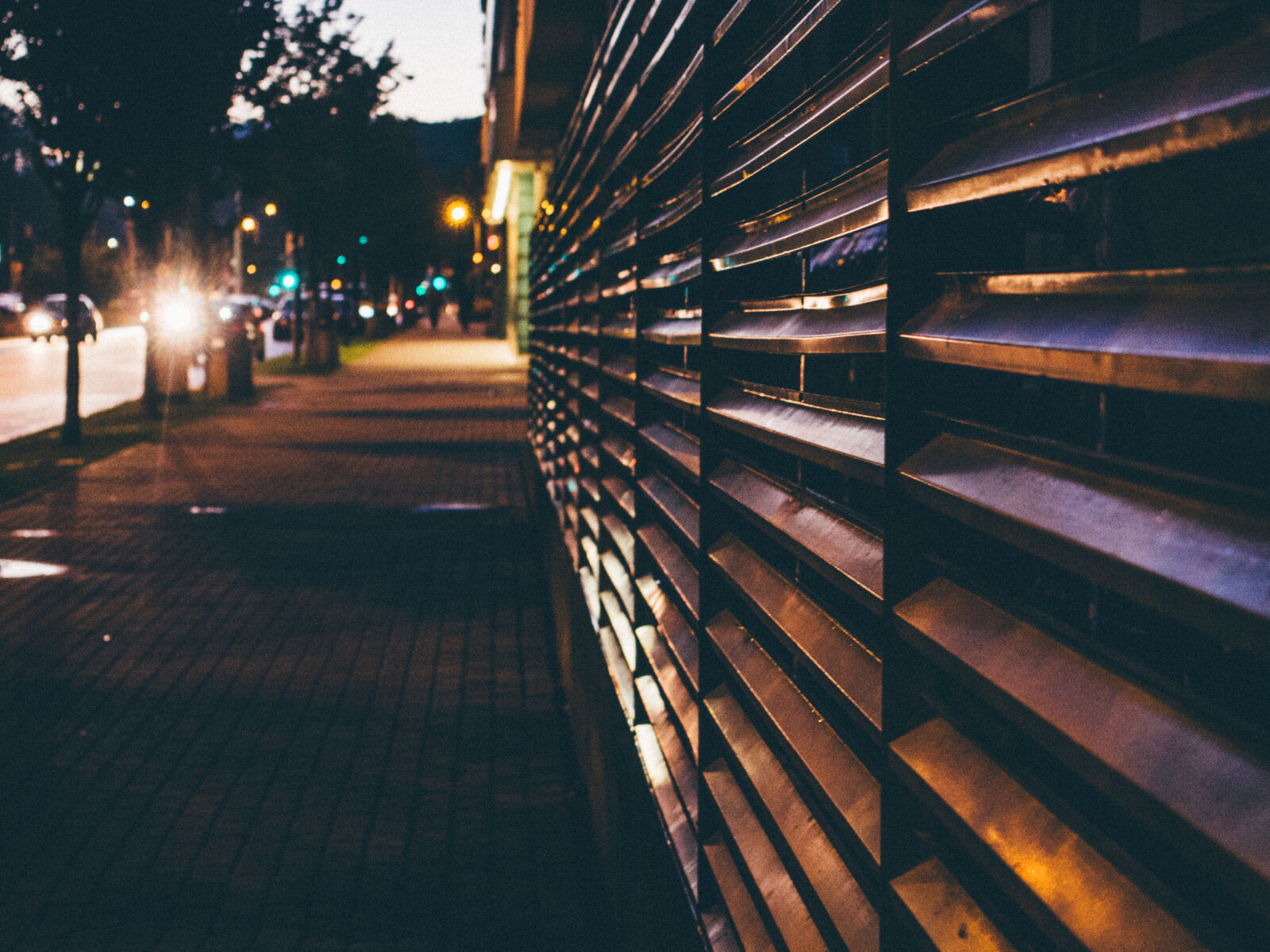 Olympus PEN E-PL5 sample photo. Fence, late, lights, night photography