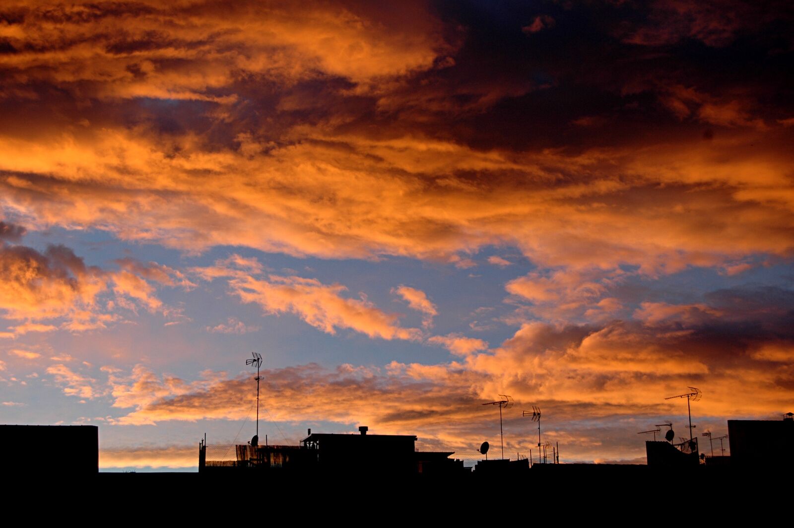 Nikon D70s sample photo. Roofs, clouds, sky photography