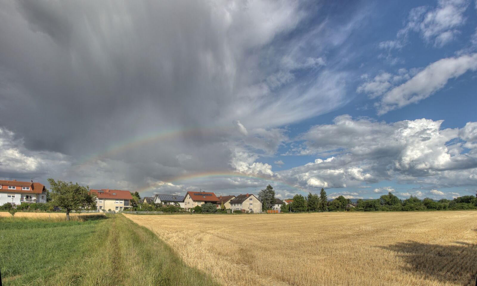 Sony SLT-A68 sample photo. Rainbow, field, sky photography