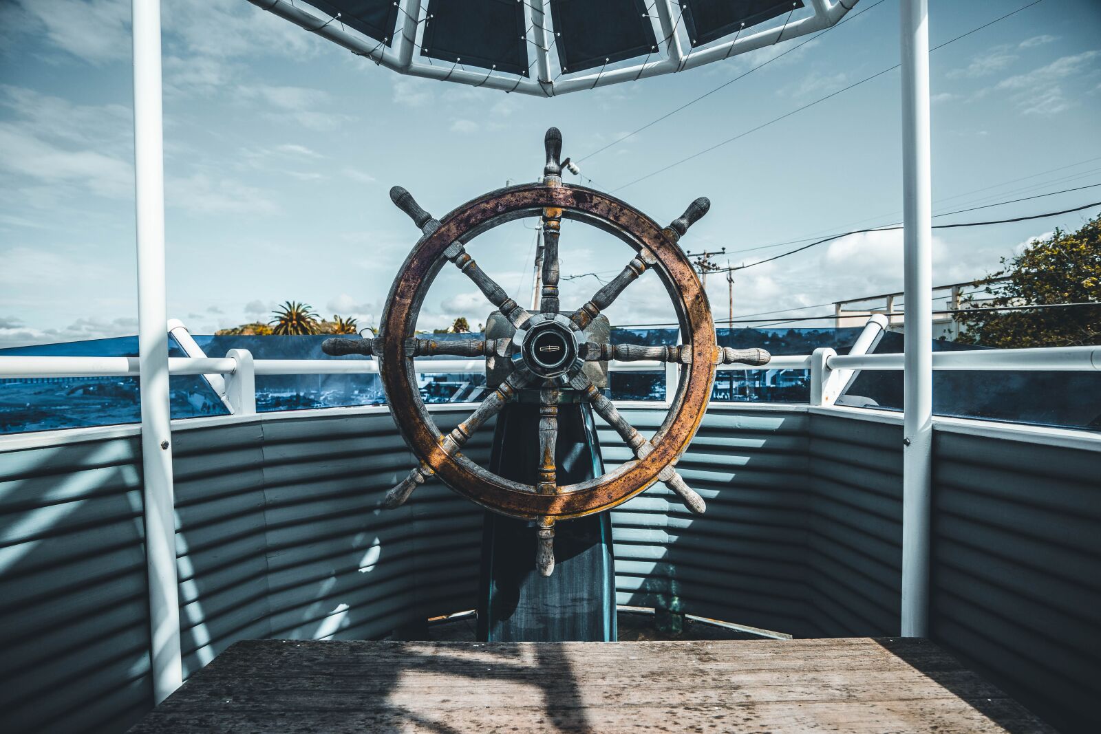 Sony a7 + Sony Vario-Tessar T* FE 16-35mm F4 ZA OSS sample photo. Boat, clouds, rustic photography