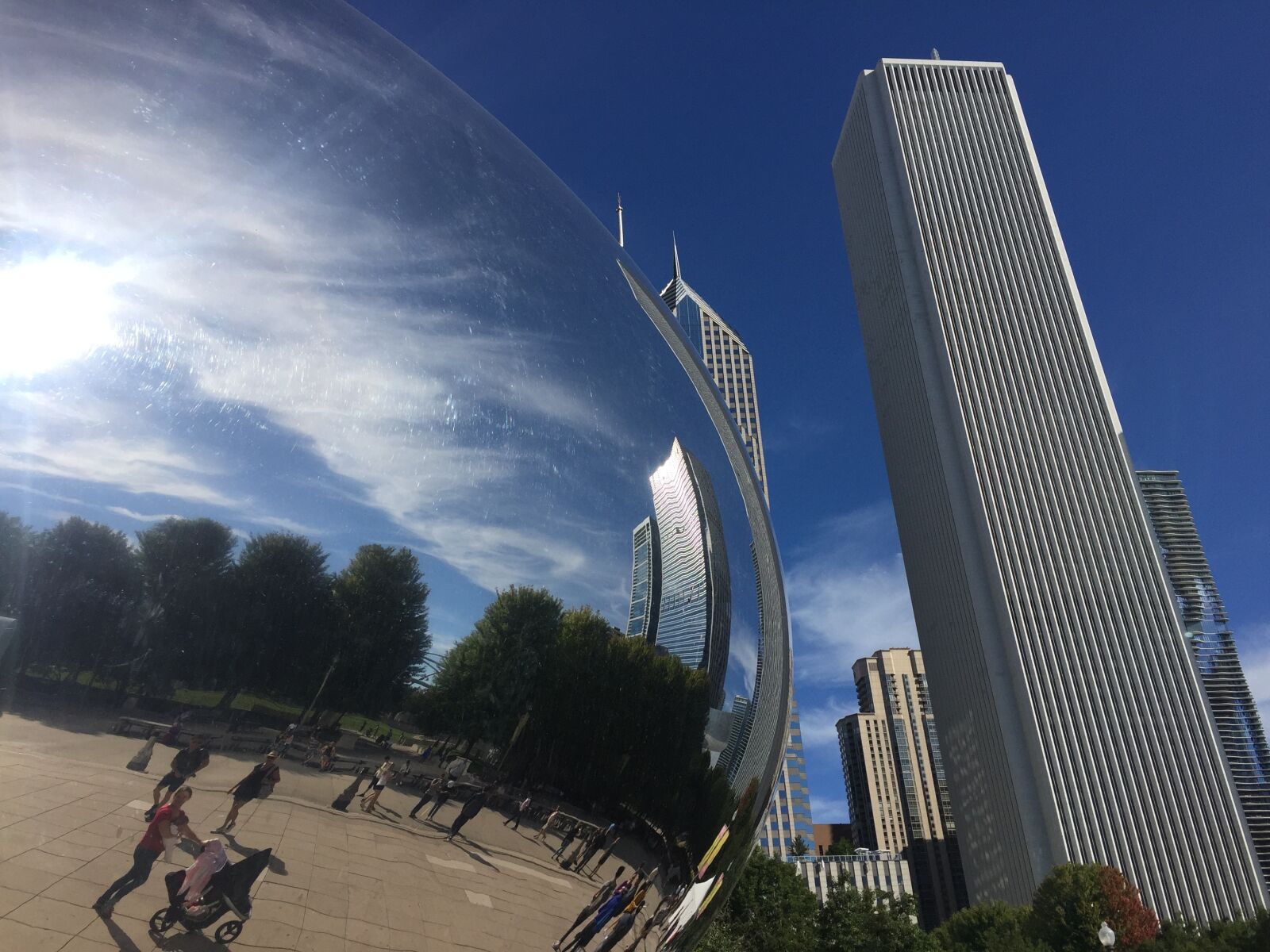 iPhone 6 back camera 4.15mm f/2.2 sample photo. Chicago, gate, clouds photography