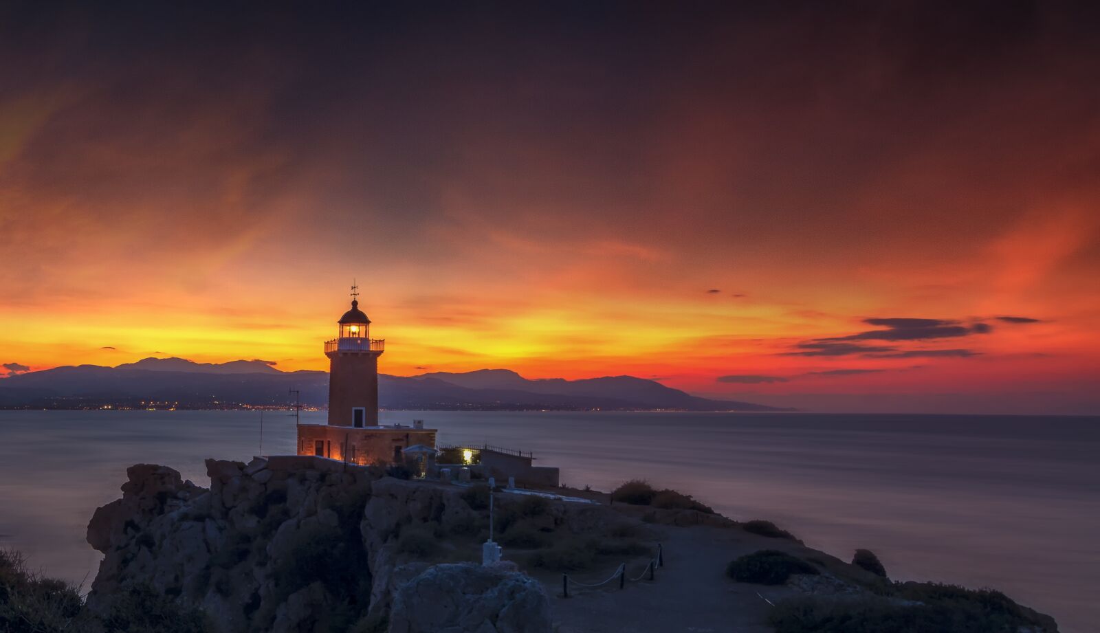 Nikon D5200 sample photo. Lighthouse, sunset, lights photography