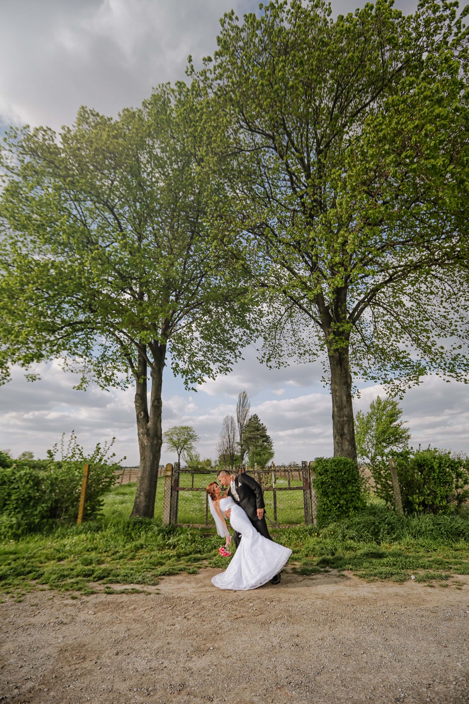 Canon EF 16-35mm F2.8L II USM sample photo. Husband, bride, village, romantic photography