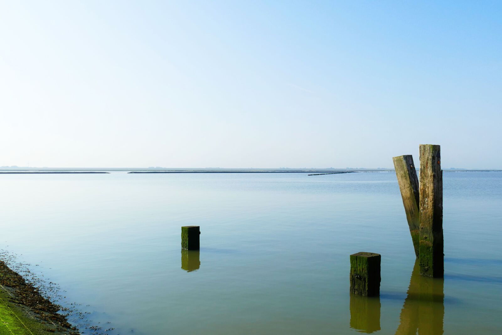 Panasonic Lumix DMC-FZ1000 sample photo. Wadden sea, peer, rest photography