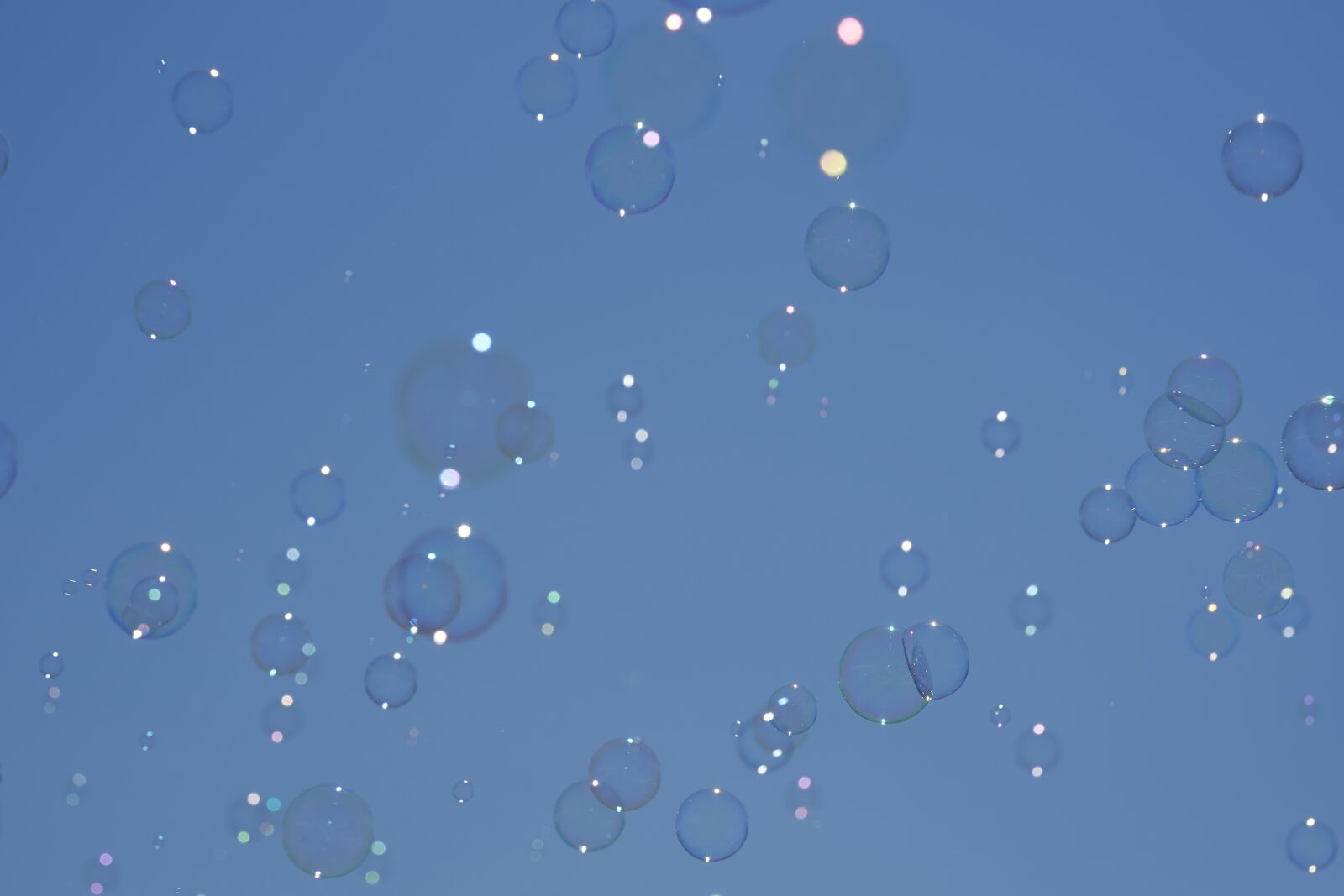 Sony FE 90mm F2.8 Macro G OSS sample photo. Soap bubbles, sky, float photography