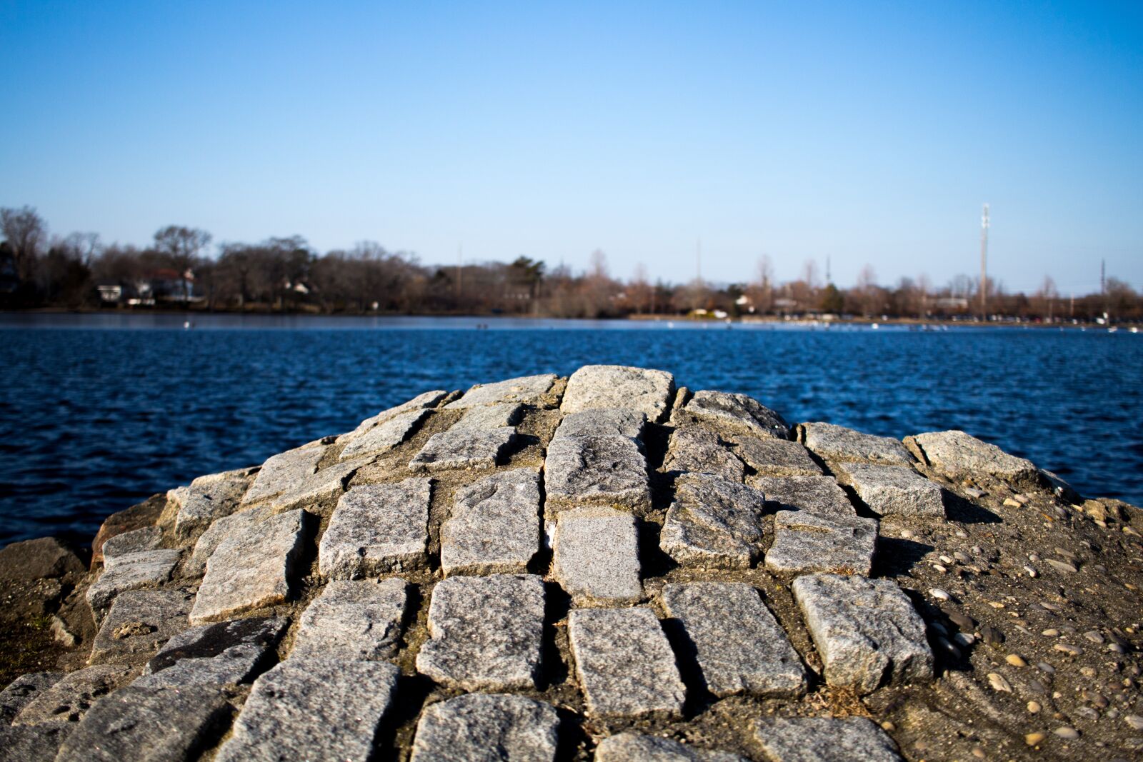 Canon EF-S 24mm F2.8 STM sample photo. Stone, lake, water photography