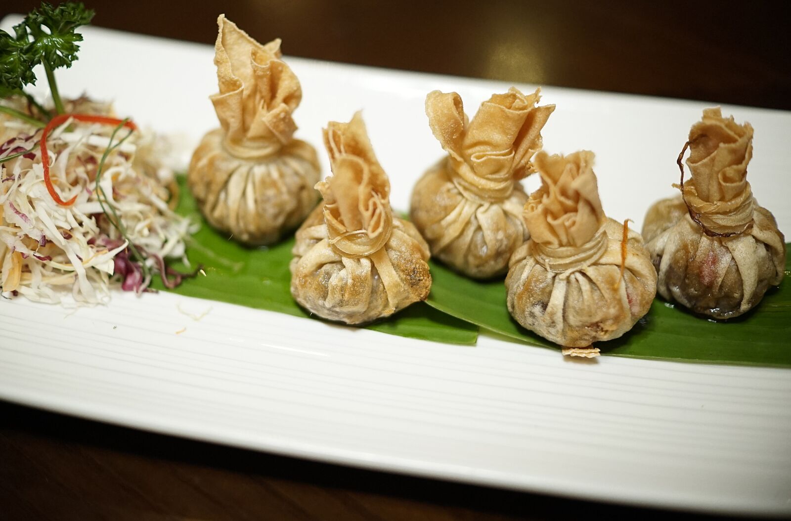 Sony a7S + Sony DT 35mm F1.8 SAM sample photo. Dumpling, spring rolls, deep photography
