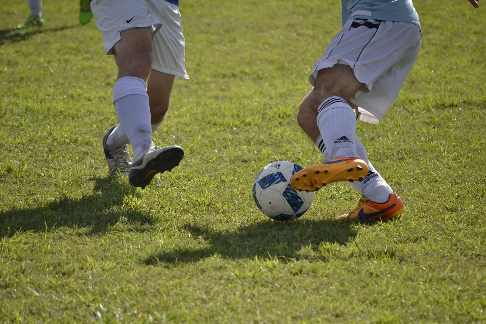 Nikon D3100 sample photo. Soccer, dribble, sport photography