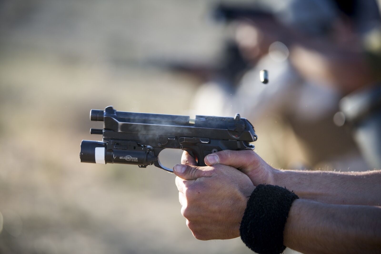 Canon EF 70-200mm F2.8L IS USM sample photo. Pistol, firearm, live-fire photography
