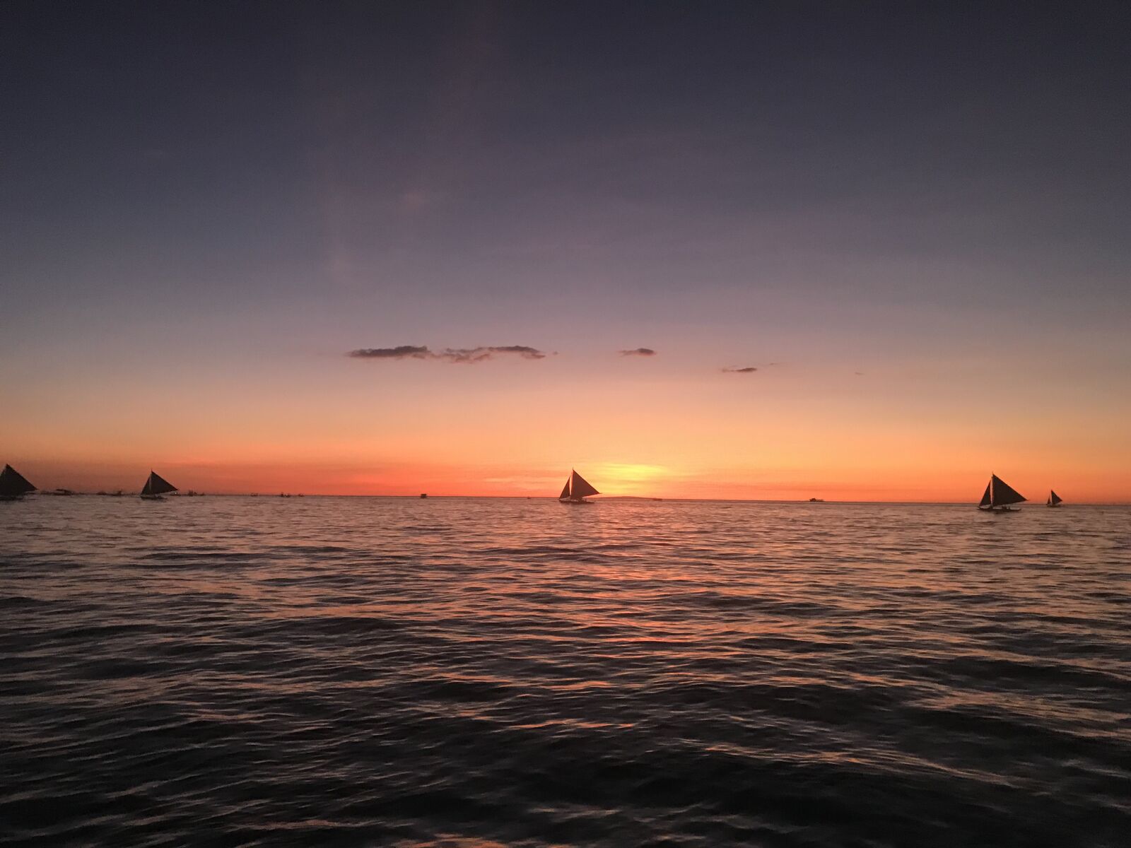 iPhone 7 back camera 3.99mm f/1.8 sample photo. Boat, sea, sky photography