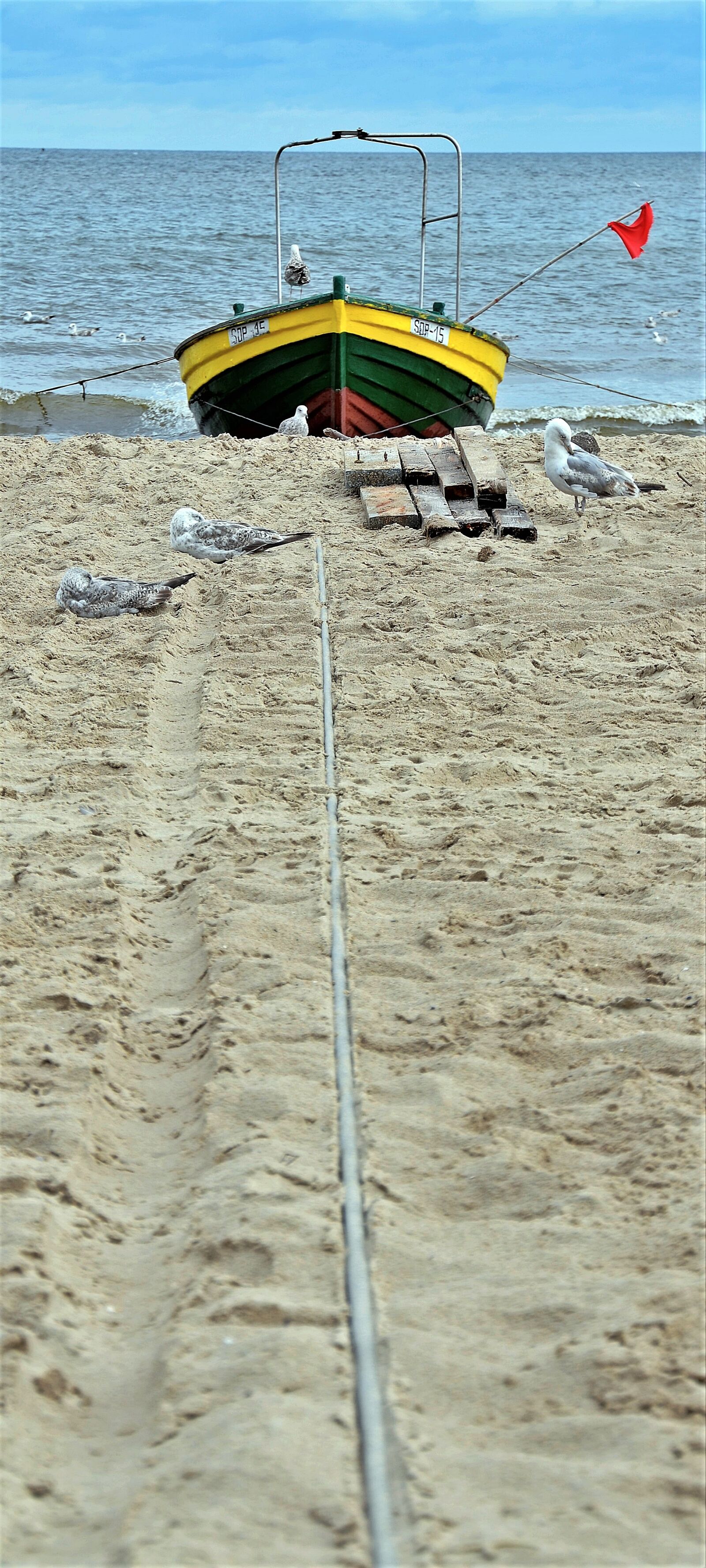 Nikon D5100 sample photo. Beach, boat, fishing photography