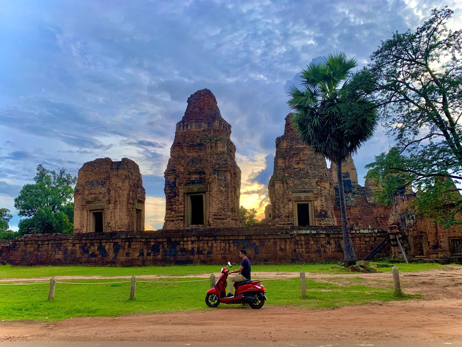Apple iPhone XS Max + iPhone XS Max back dual camera 4.25mm f/1.8 sample photo. Temple, motorbike, siemreap photography