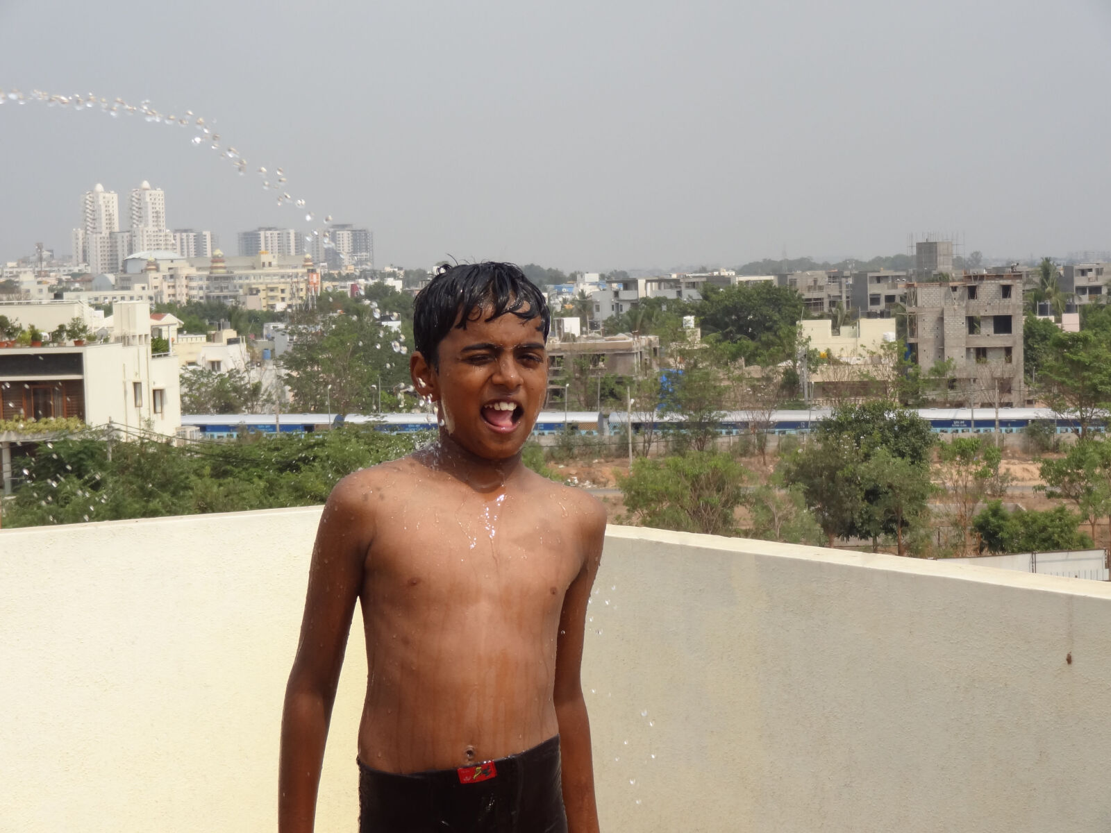 Sony Cyber-shot DSC-HX9V sample photo. Boy, closing, eye, boy photography
