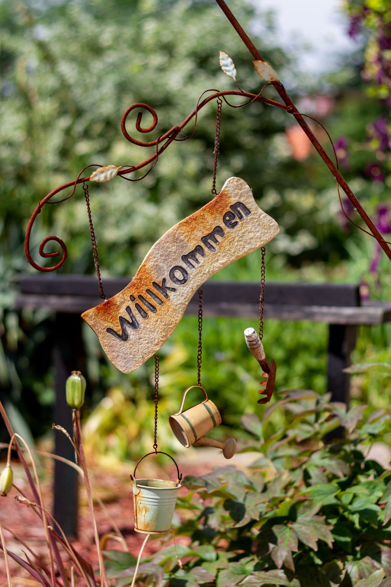 Canon EOS 7D sample photo. Garden, shield, welcome photography
