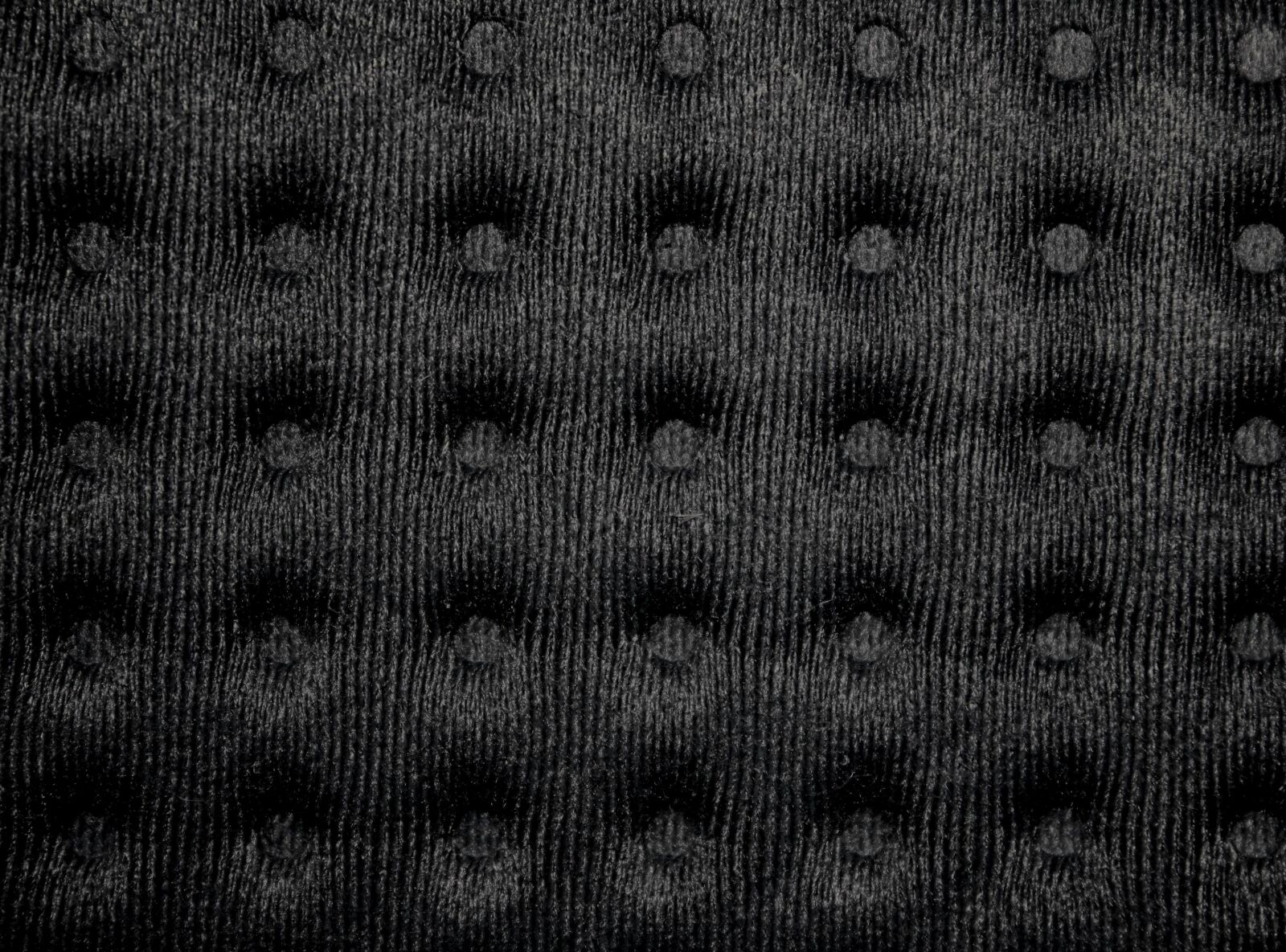f/3.5-5.6 IS sample photo. Black, tufted, fabric, textil photography