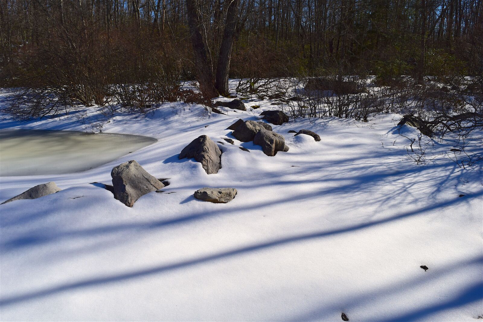 Nikon D3300 sample photo. Snow, shadow, rock photography