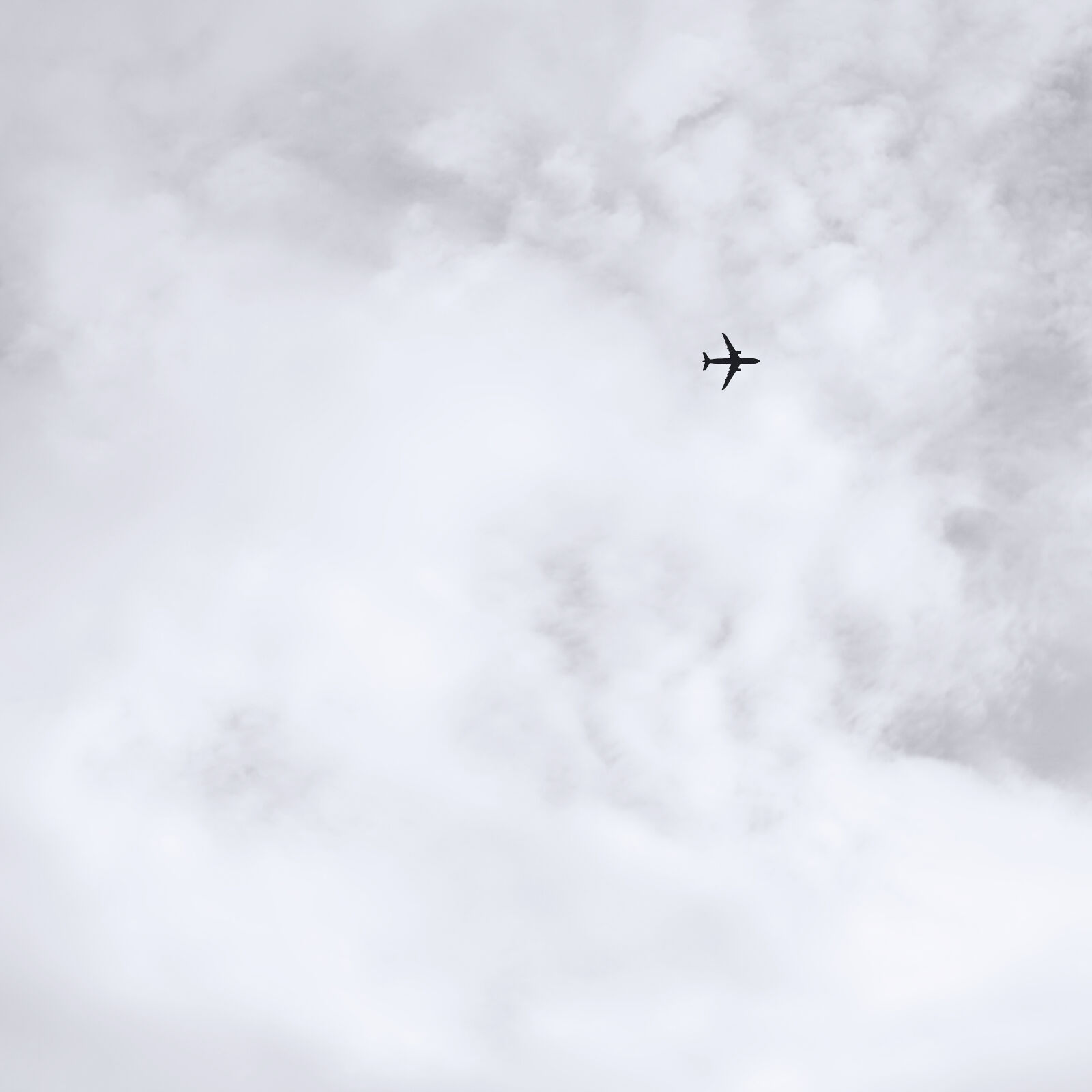 Canon EOS 600D (Rebel EOS T3i / EOS Kiss X5) + Canon EF 50mm F1.8 II sample photo. Silhouette, of, airplane, flying photography