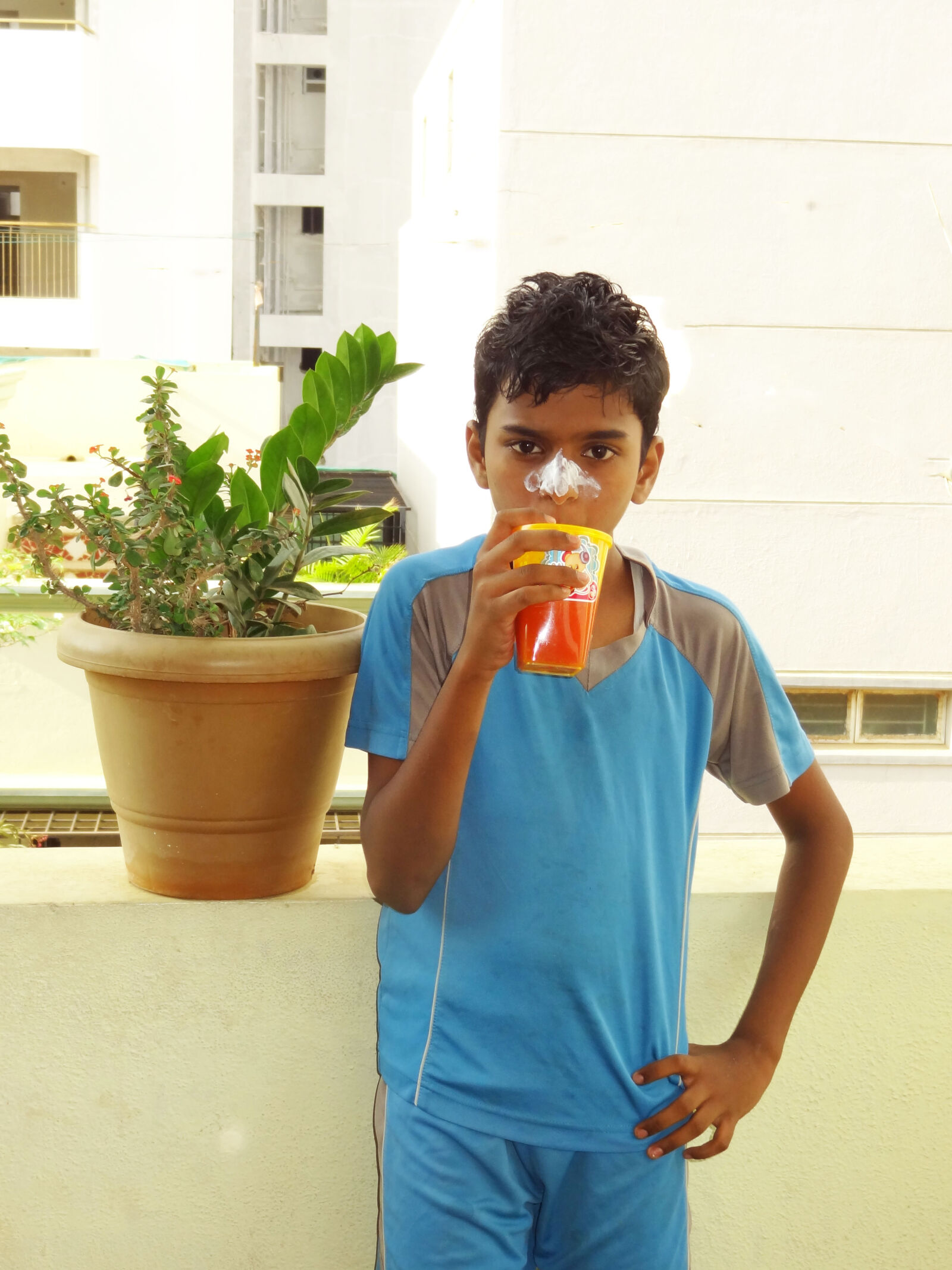 Sony Cyber-shot DSC-HX9V sample photo. Boy, drinking, juice, boy photography