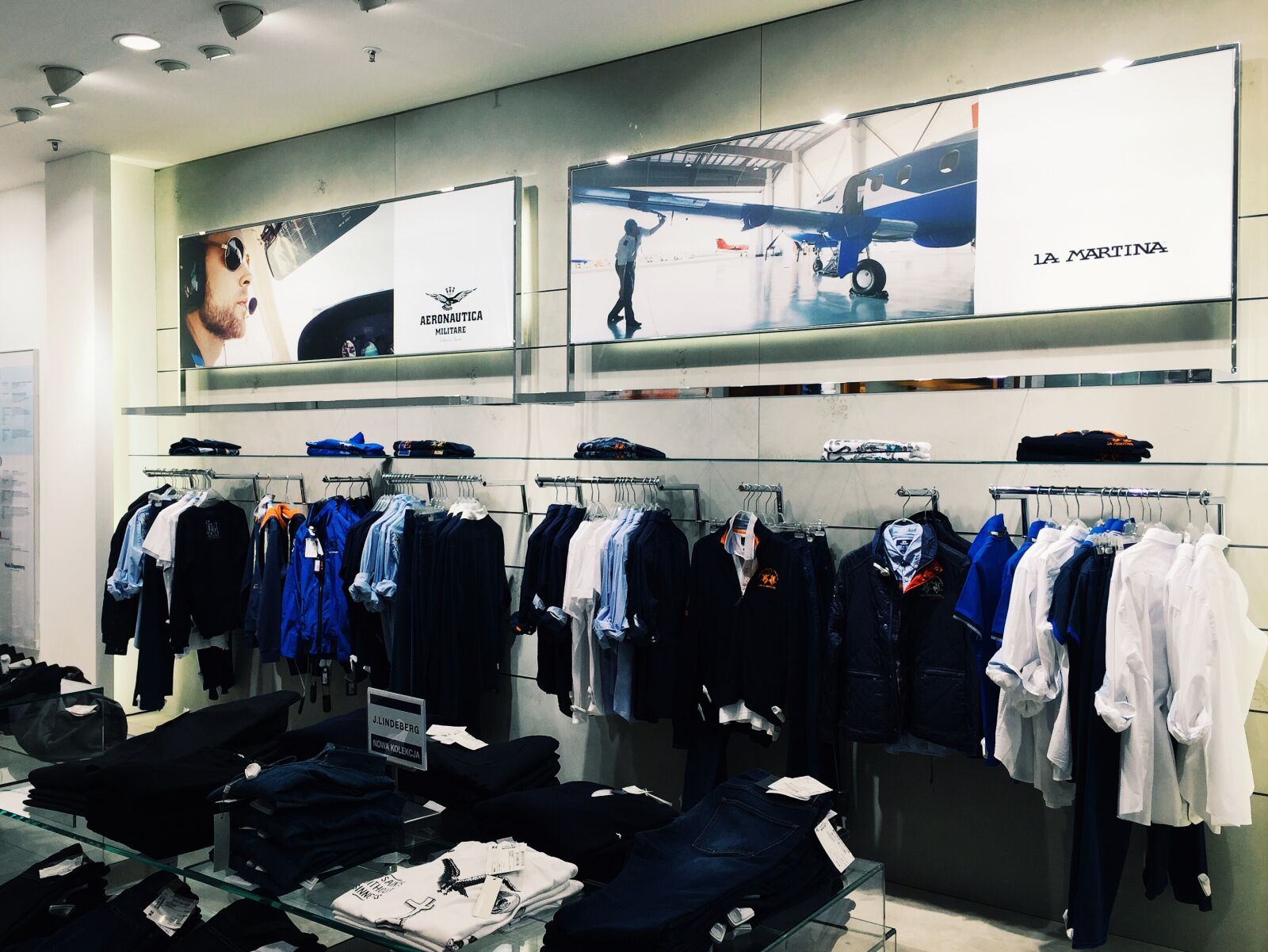 Apple iPhone 6 sample photo. Clothes, hanging, in, store photography