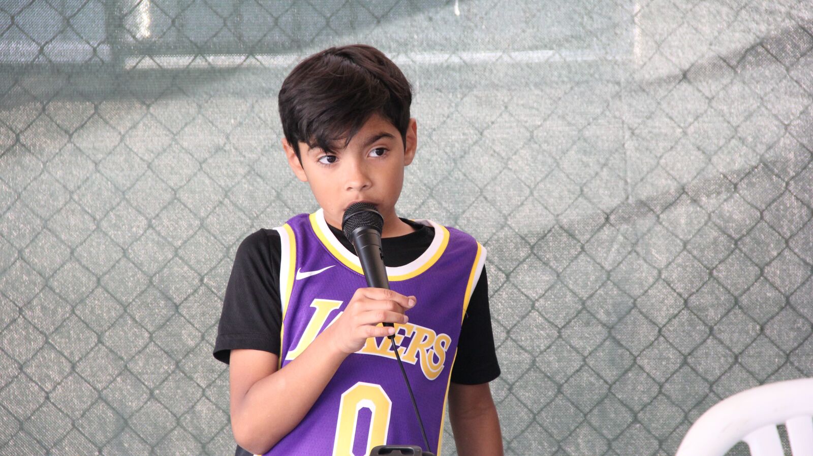 Canon EF-S 18-135mm F3.5-5.6 IS sample photo. Kid, singing, karaoke photography