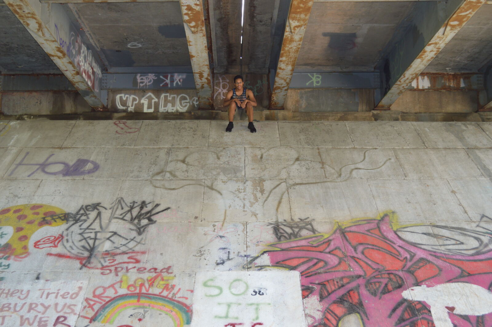 Nikon D3200 sample photo. Concrete, graffiti, man, sitting photography