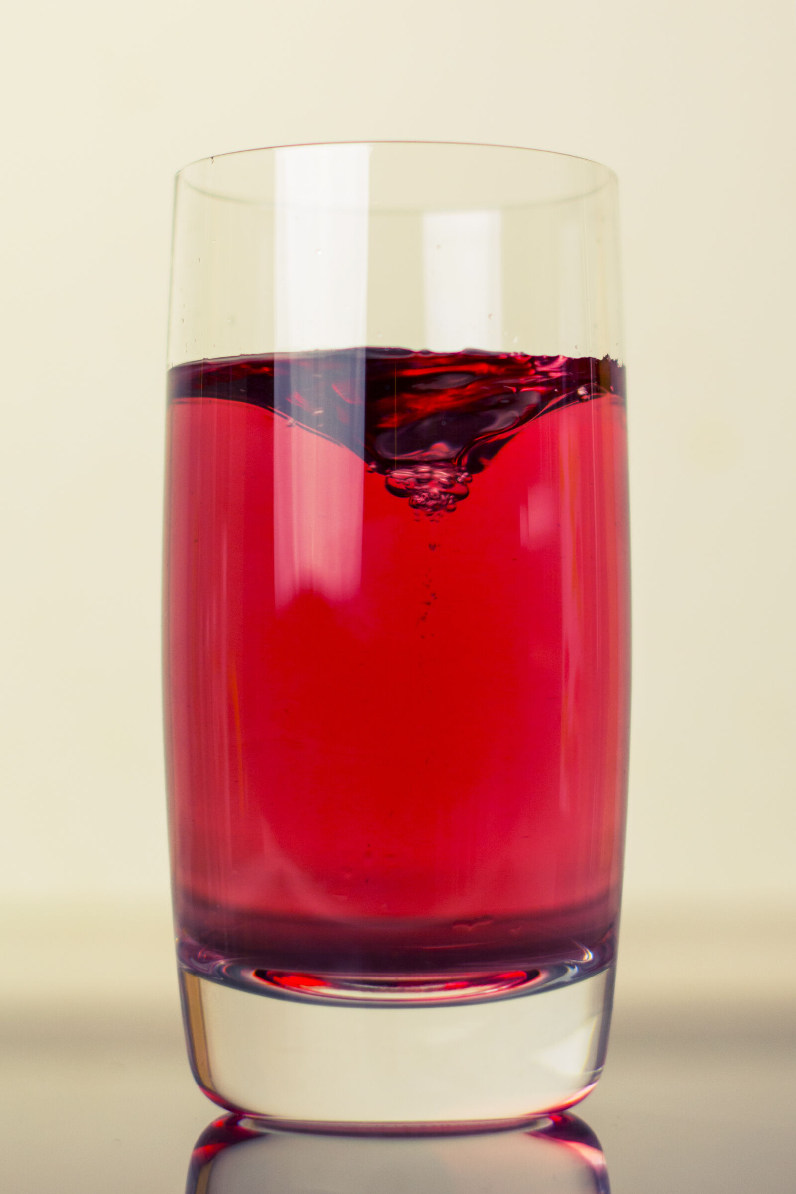 Nikon D5200 + Nikon AF-S Nikkor 50mm F1.4G sample photo. Drink, glass, juice, swirl photography