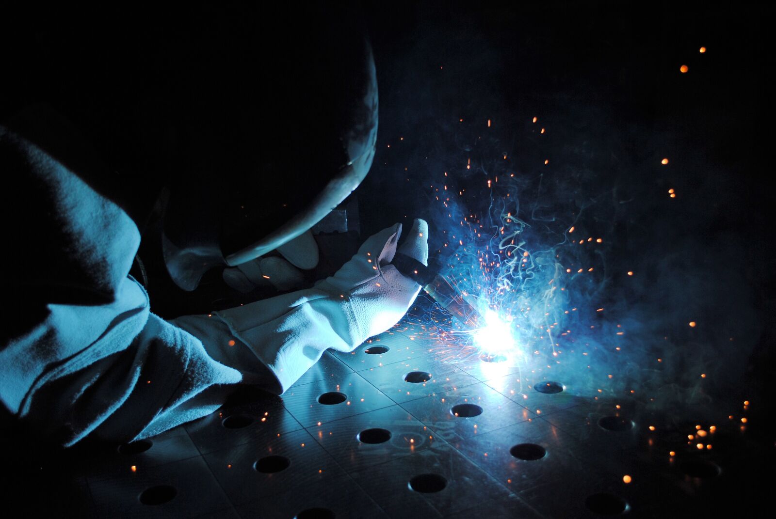 Nikon D3000 sample photo. Welder, metal photography