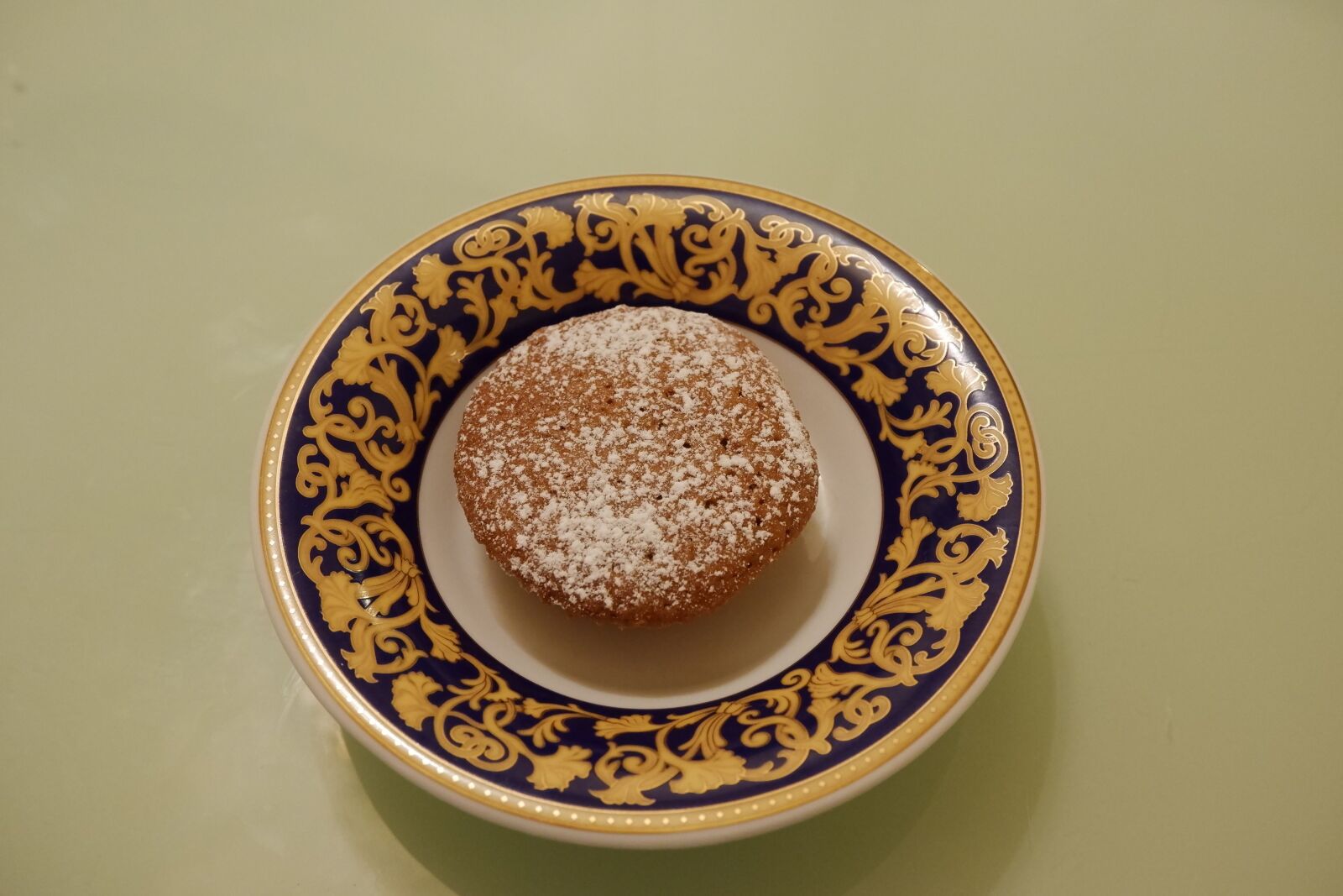 Fujifilm XC 15-45mm F3.5-5.6 OIS PZ sample photo. Cupcake, saucer, chocolate photography