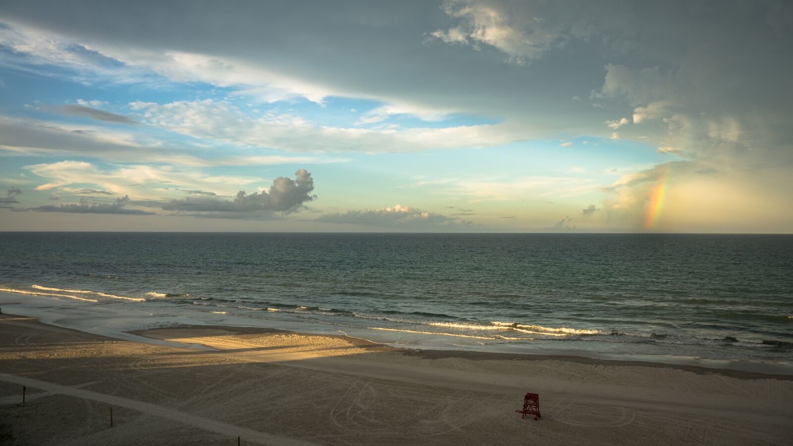 Sony Alpha NEX-5R + Sony E 18-55mm F3.5-5.6 OSS sample photo. Beach, sunset, rainbow photography