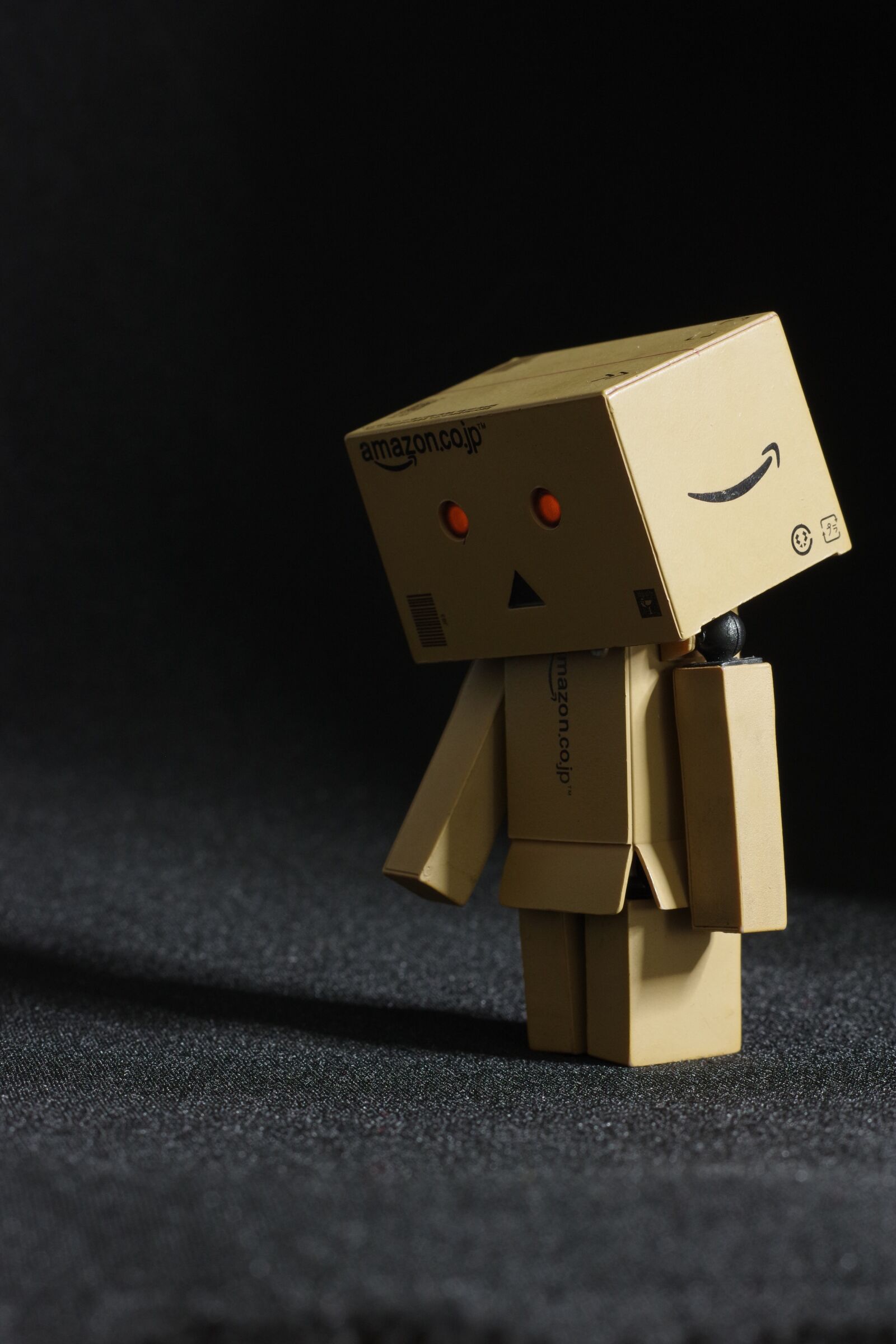 Pentax K-70 sample photo. Cardboardman, cardboard, sad photography