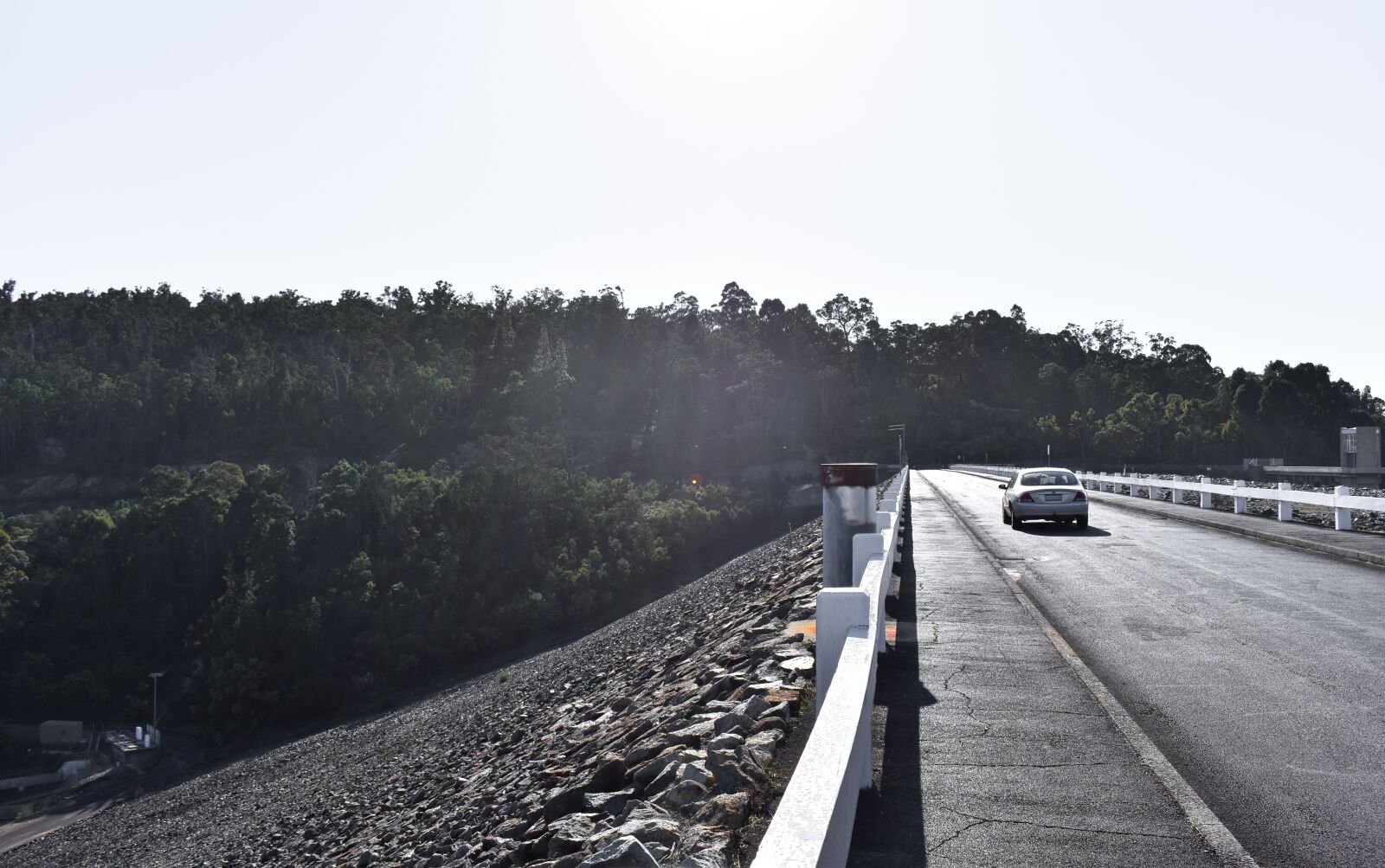 Nikon D5600 sample photo. Dam, road, car photography